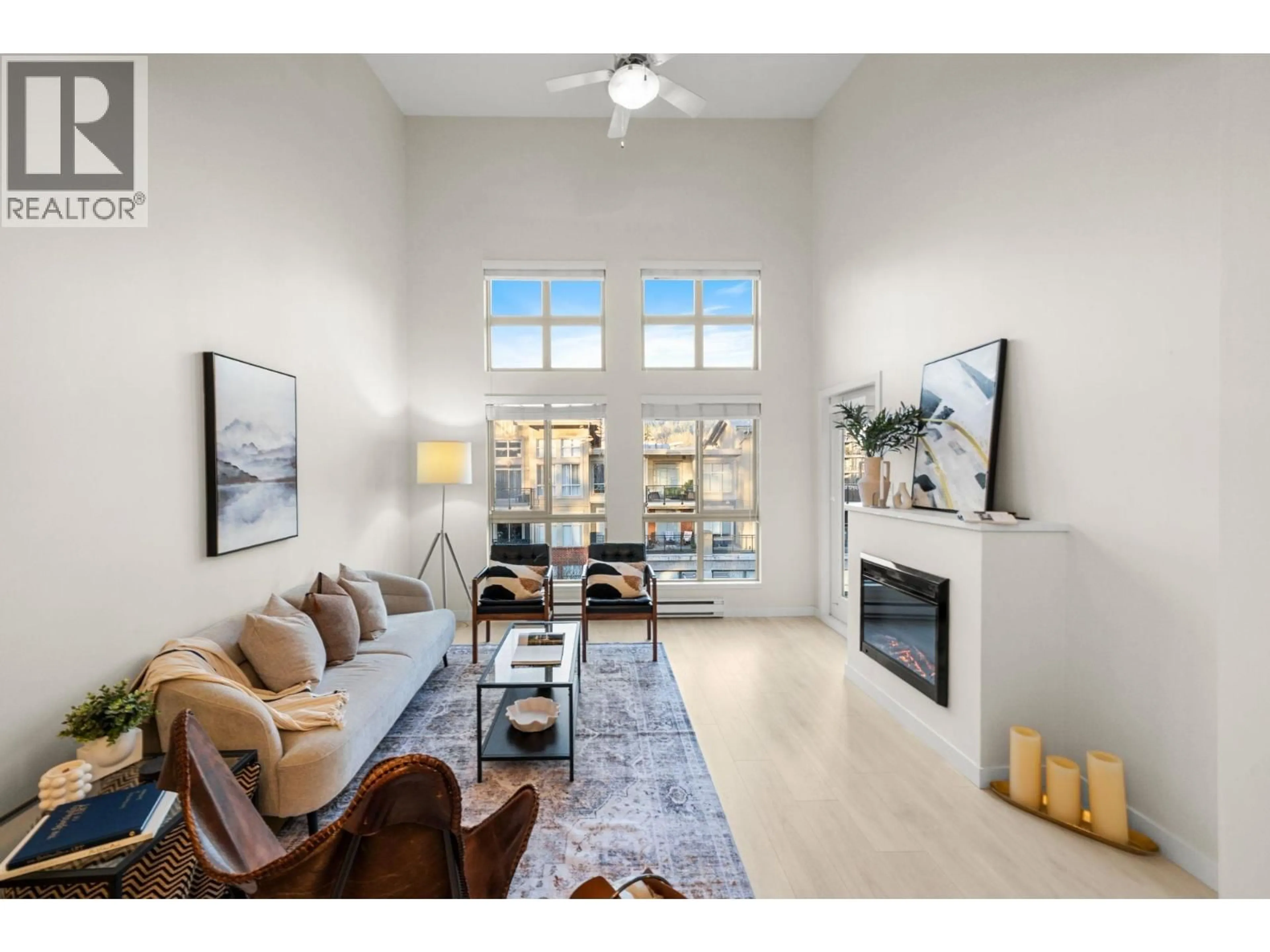 Living room with furniture, unknown for 407 - 201 MORRISSEY ROAD, Port Moody British Columbia V3H0E5