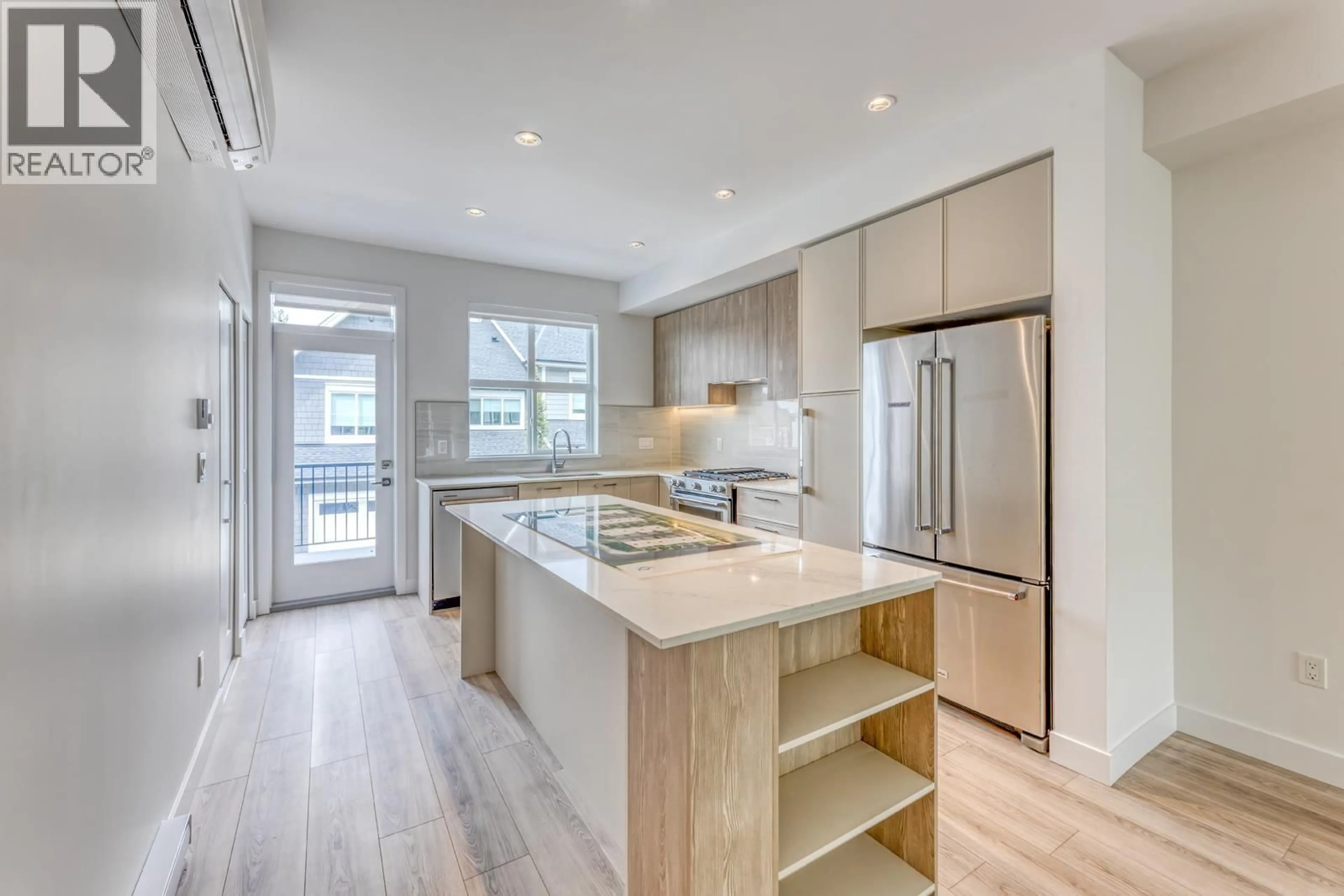 Open concept kitchen, wood/laminate floor for 120 - 3421 QUEENSTON AVENUE, Coquitlam British Columbia V3E0V9