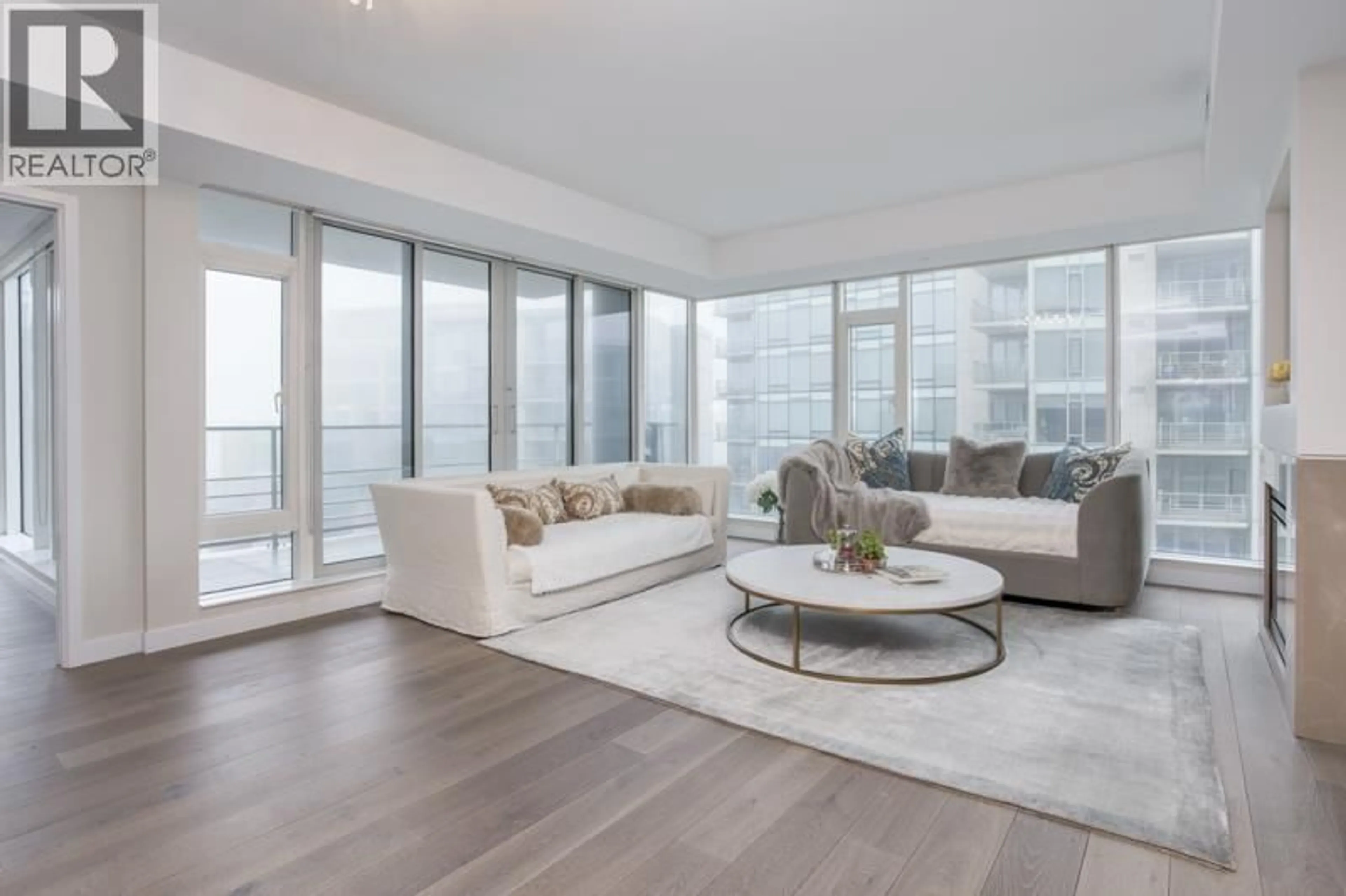 Living room with furniture, unknown for 702 - 5171 BRIGHOUSE WAY, Richmond British Columbia V7C0A6