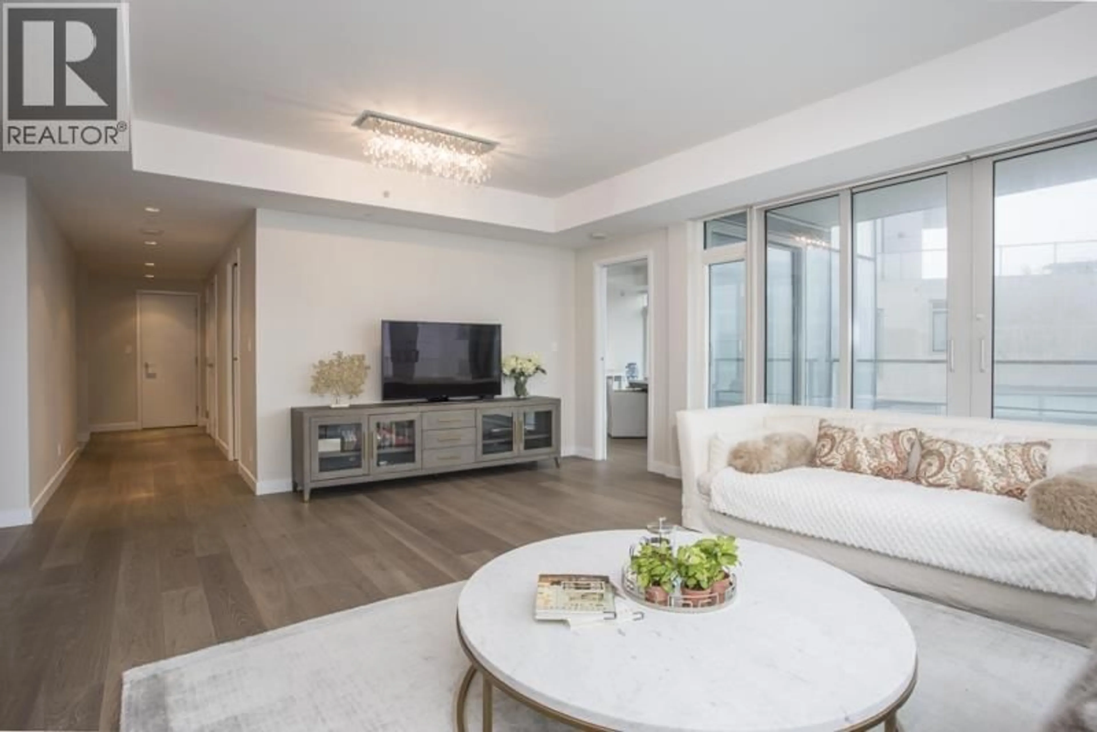 Living room with furniture, unknown for 702 - 5171 BRIGHOUSE WAY, Richmond British Columbia V7C0A6