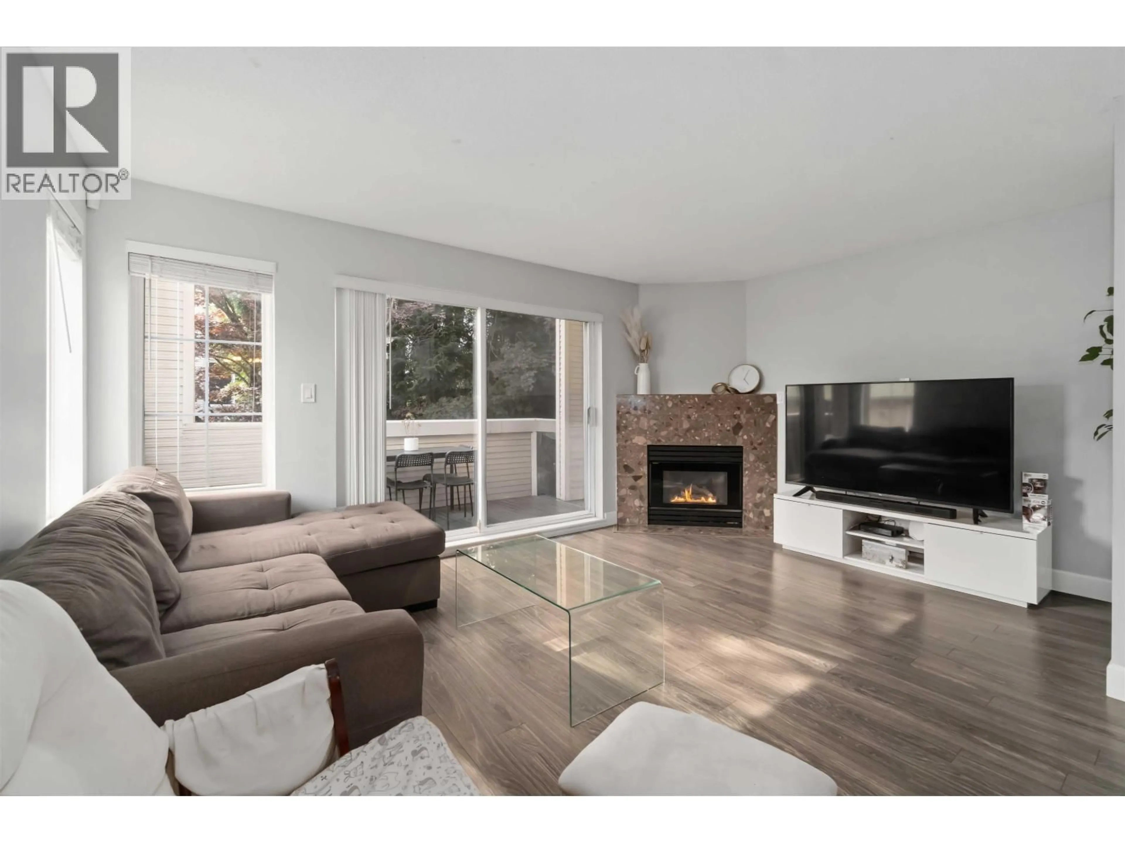 Living room with furniture, wood/laminate floor for 24 - 270 CASEY STREET, Coquitlam British Columbia V3K6Y4