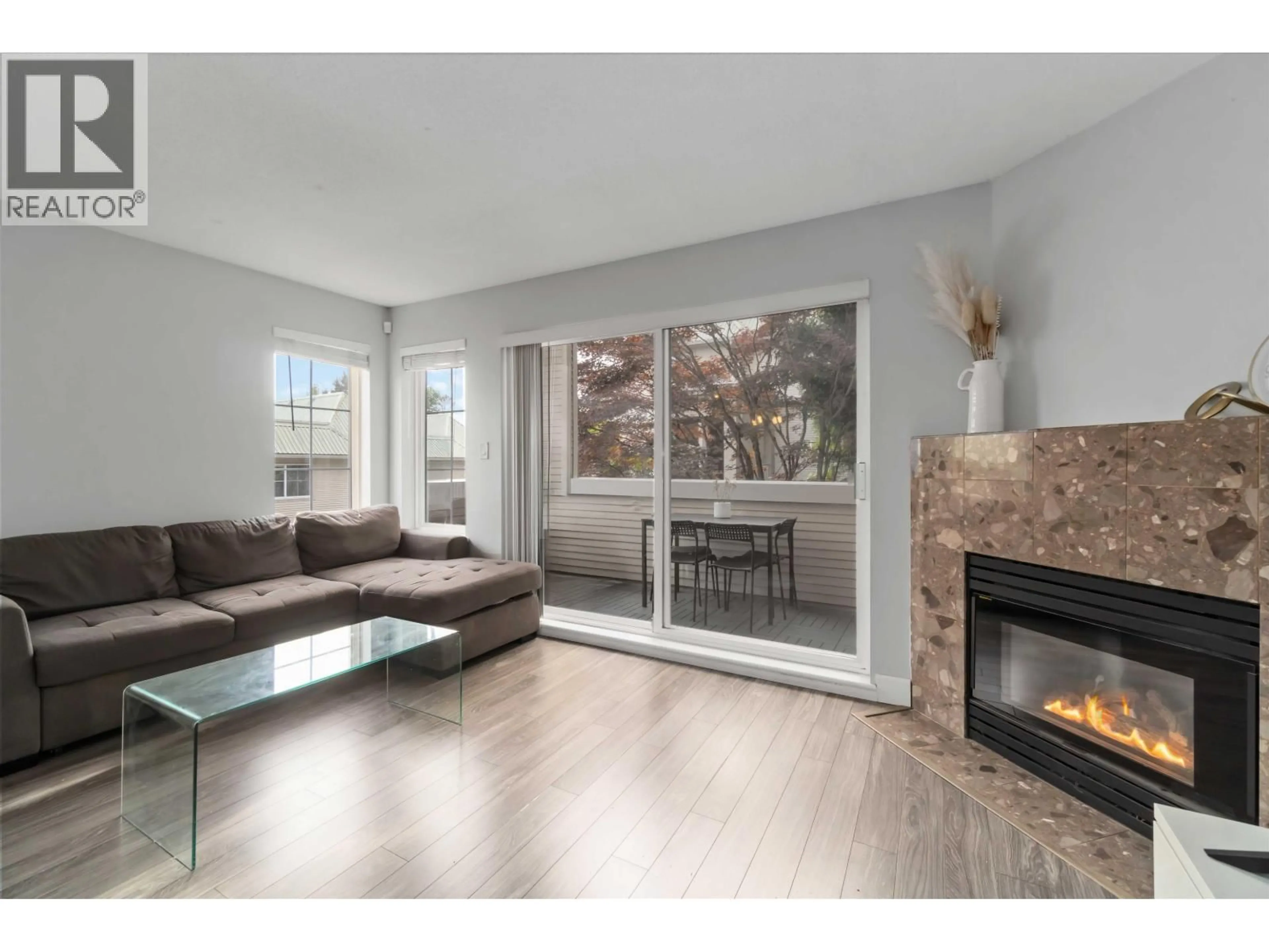 Living room with furniture, wood/laminate floor for 24 - 270 CASEY STREET, Coquitlam British Columbia V3K6Y4