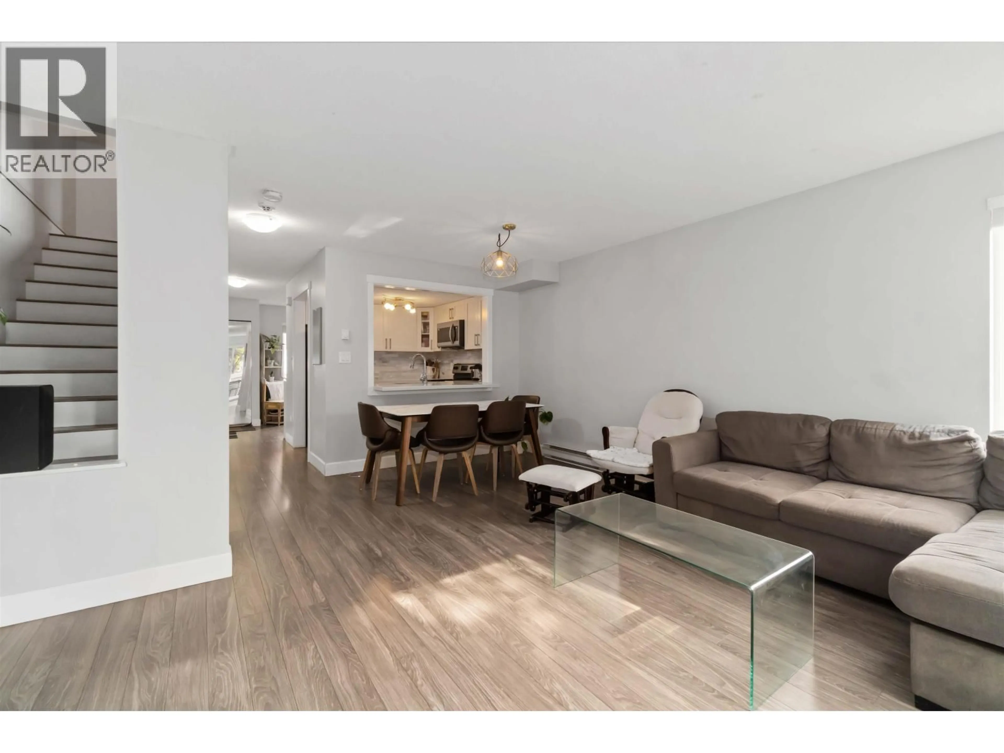 Living room with furniture, wood/laminate floor for 24 - 270 CASEY STREET, Coquitlam British Columbia V3K6Y4