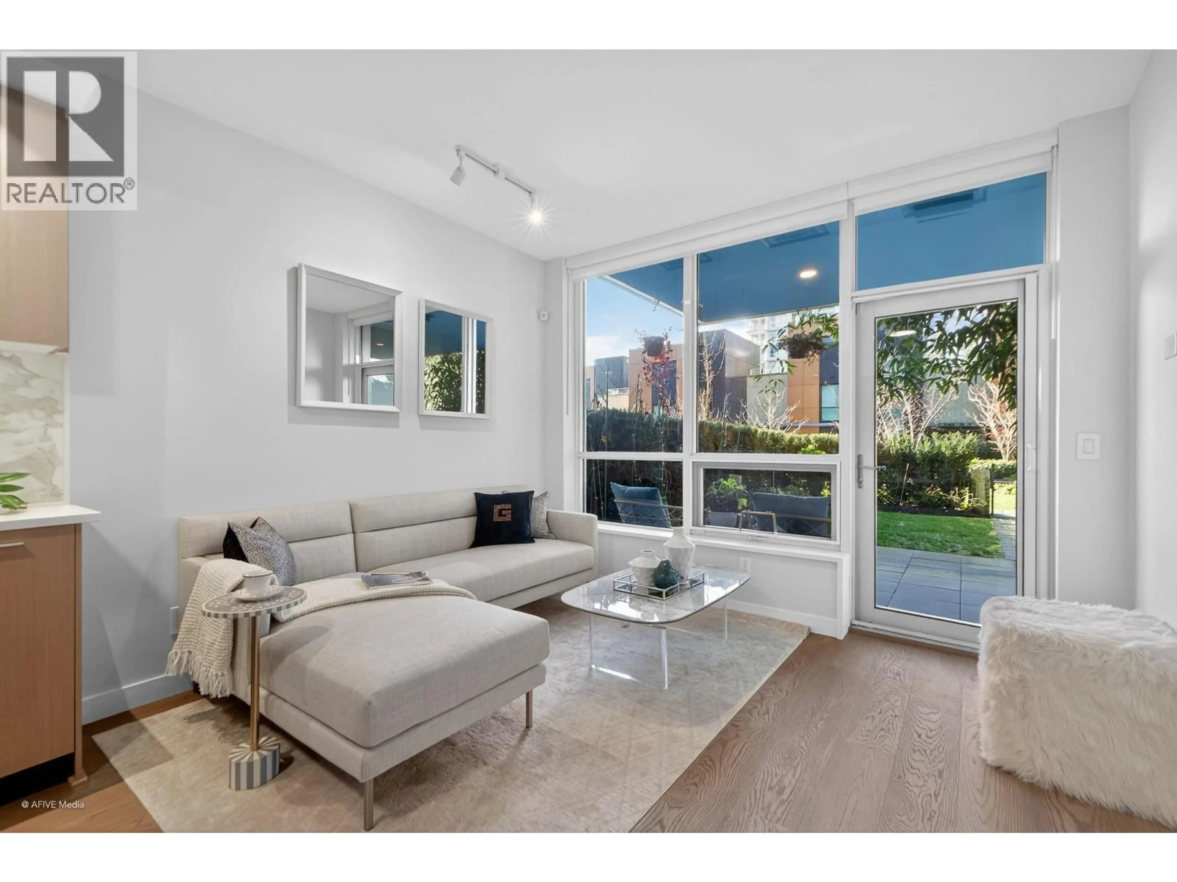 Living room with furniture, unknown for 101 - 5608 BERTON AVENUE, Vancouver British Columbia V6S0M6