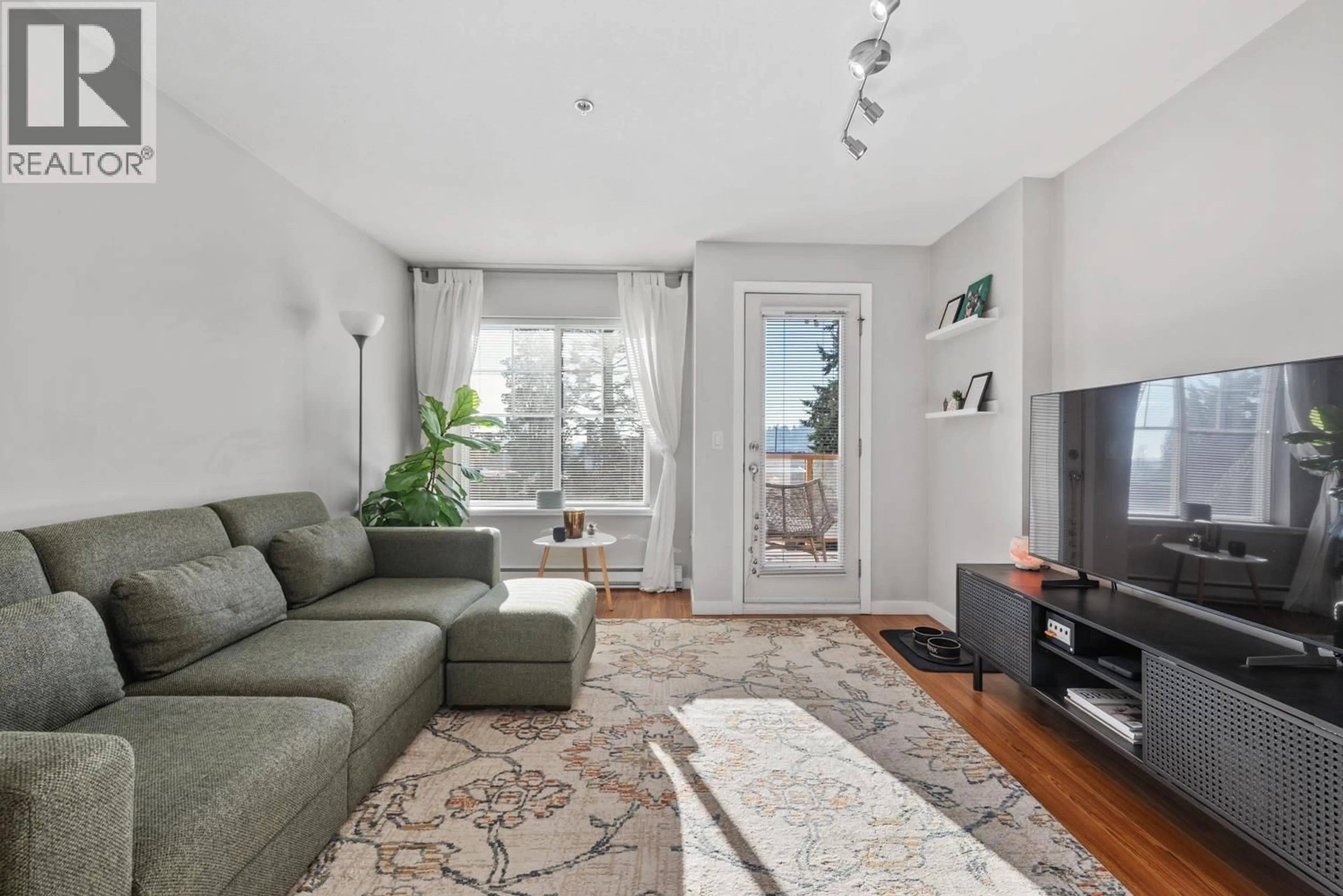 Living room with furniture, unknown for 412 - 1969 WESTMINSTER AVENUE, Port Coquitlam British Columbia V3B1E7