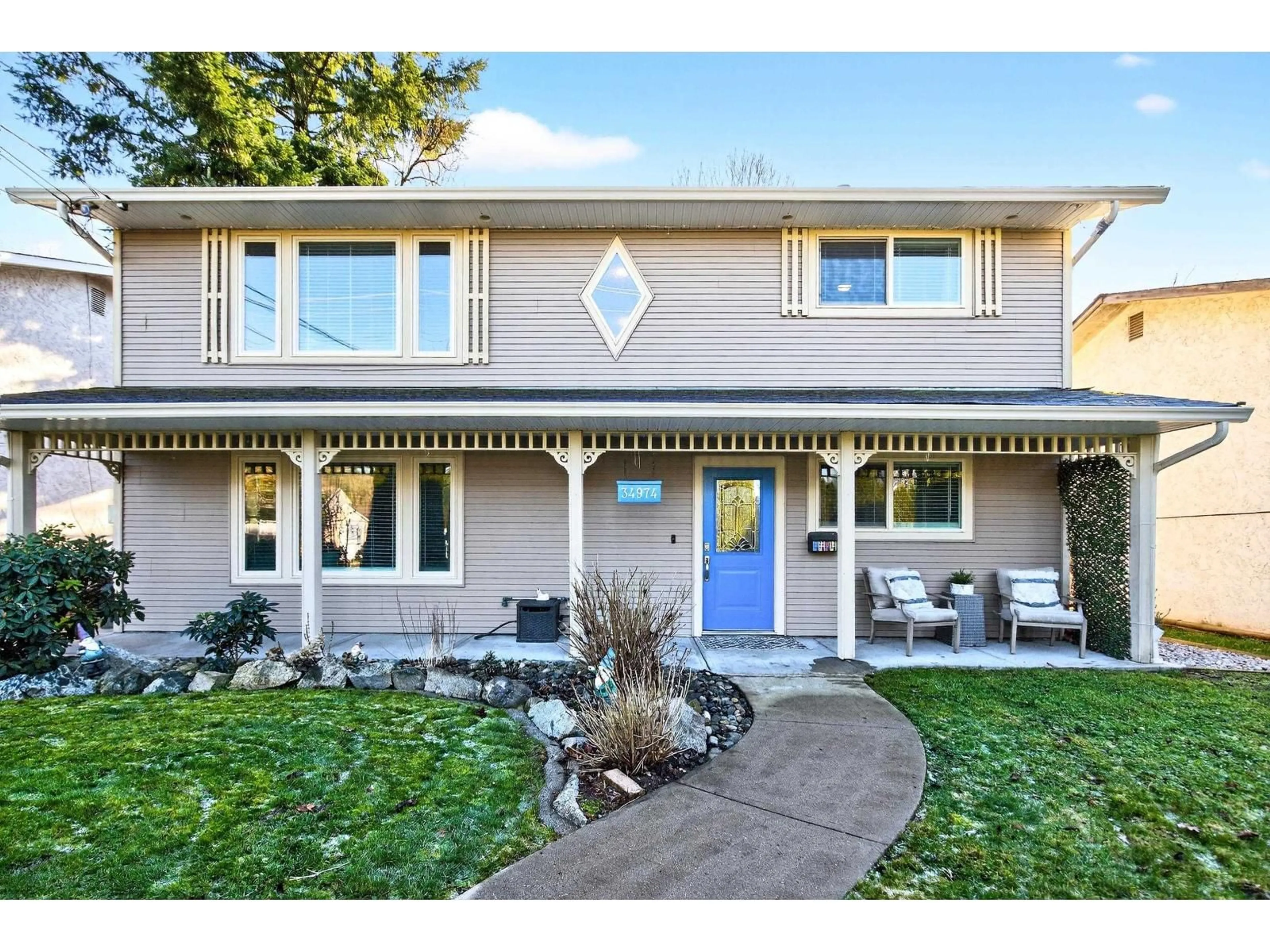 Home with vinyl exterior material, street for 34974 CLAYBURN ROAD, Abbotsford British Columbia V2S7Y9