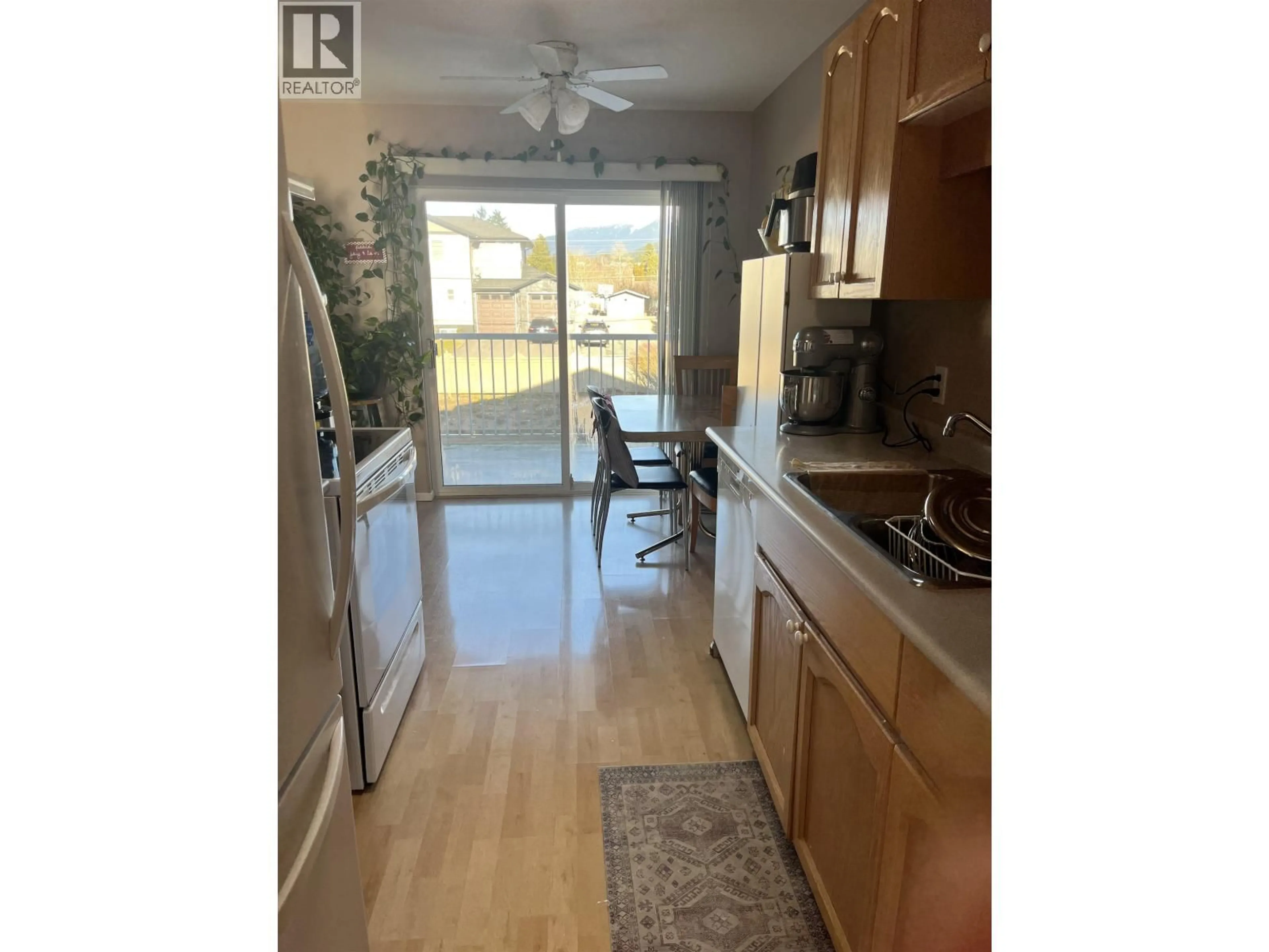 Open concept kitchen, wood/laminate floor for 4 - 4737 WALSH AVENUE, Terrace British Columbia V8G1Y7