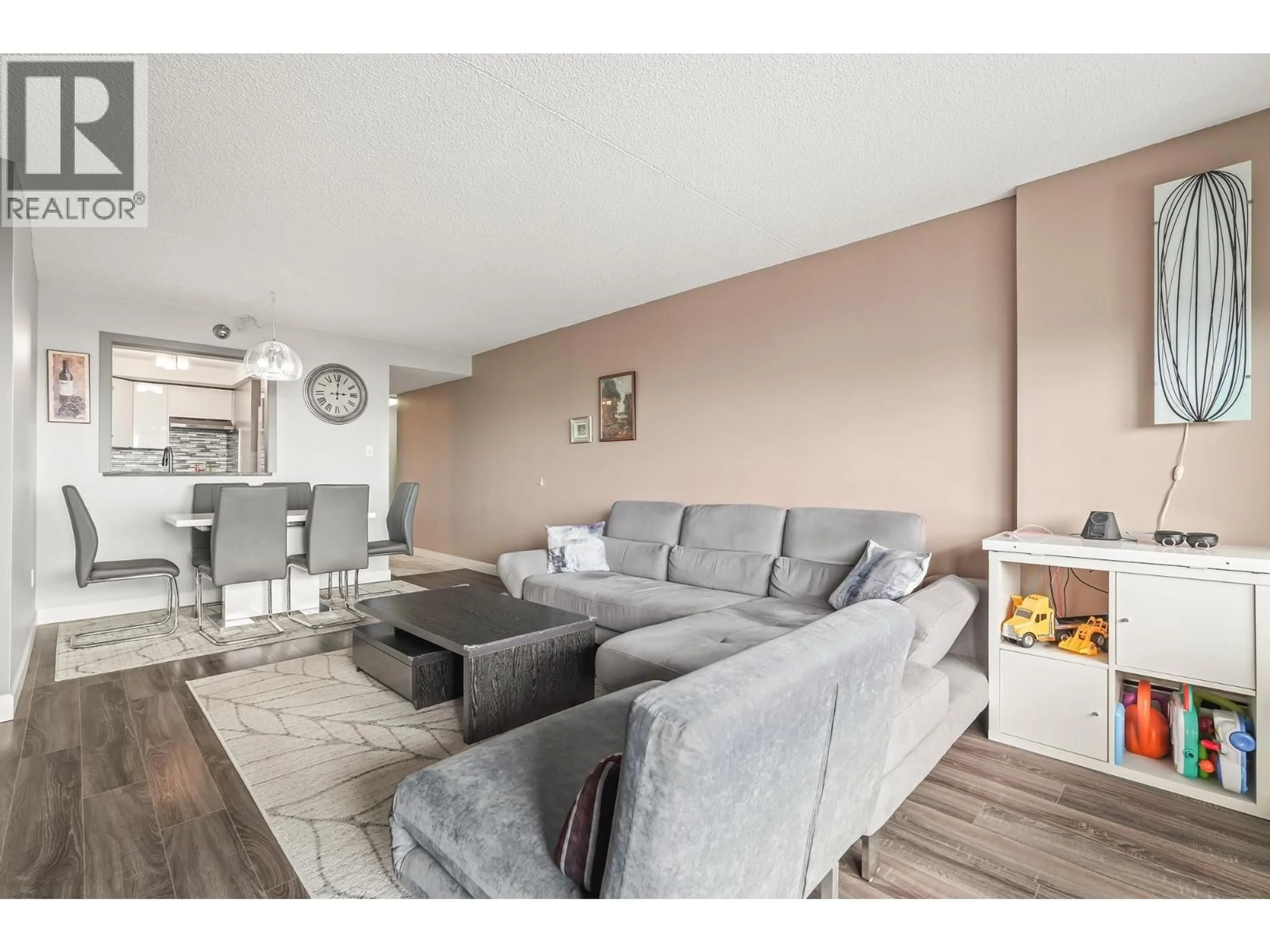 Living room with furniture, wood/laminate floor for 1607 - 6595 WILLINGDON AVENUE, Burnaby British Columbia V5H4E5