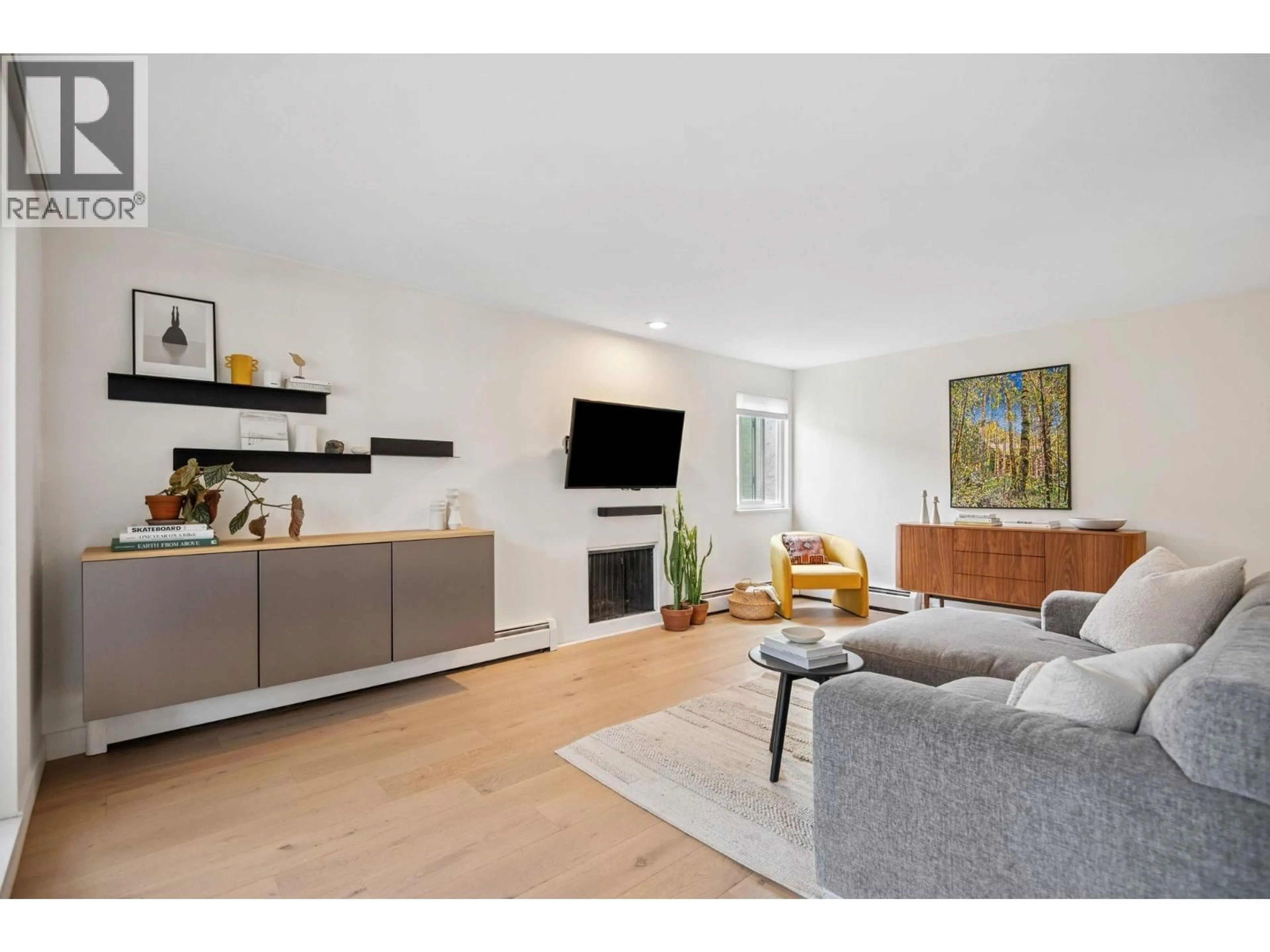 Living room with furniture, unknown for 209 - 1420 8 AVENUE, Vancouver British Columbia V5N1T4