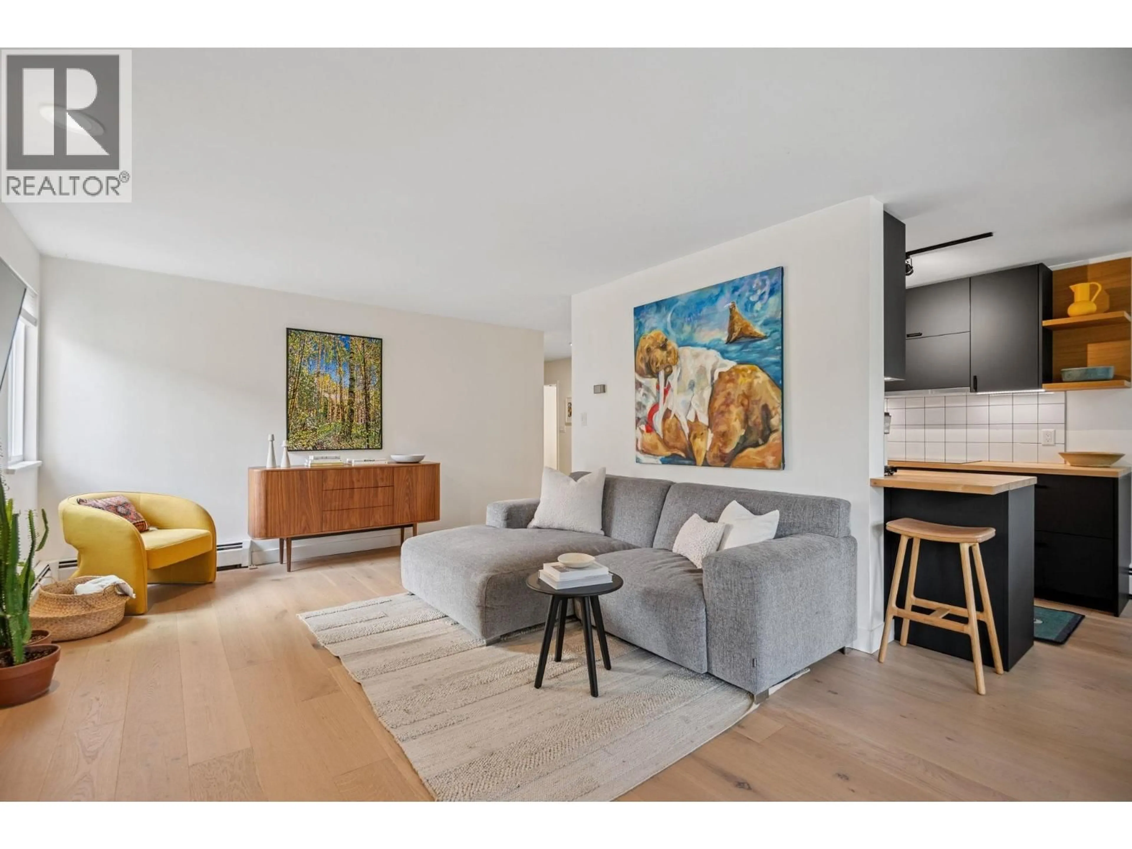 Living room with furniture, wood/laminate floor for 209 - 1420 8 AVENUE, Vancouver British Columbia V5N1T4