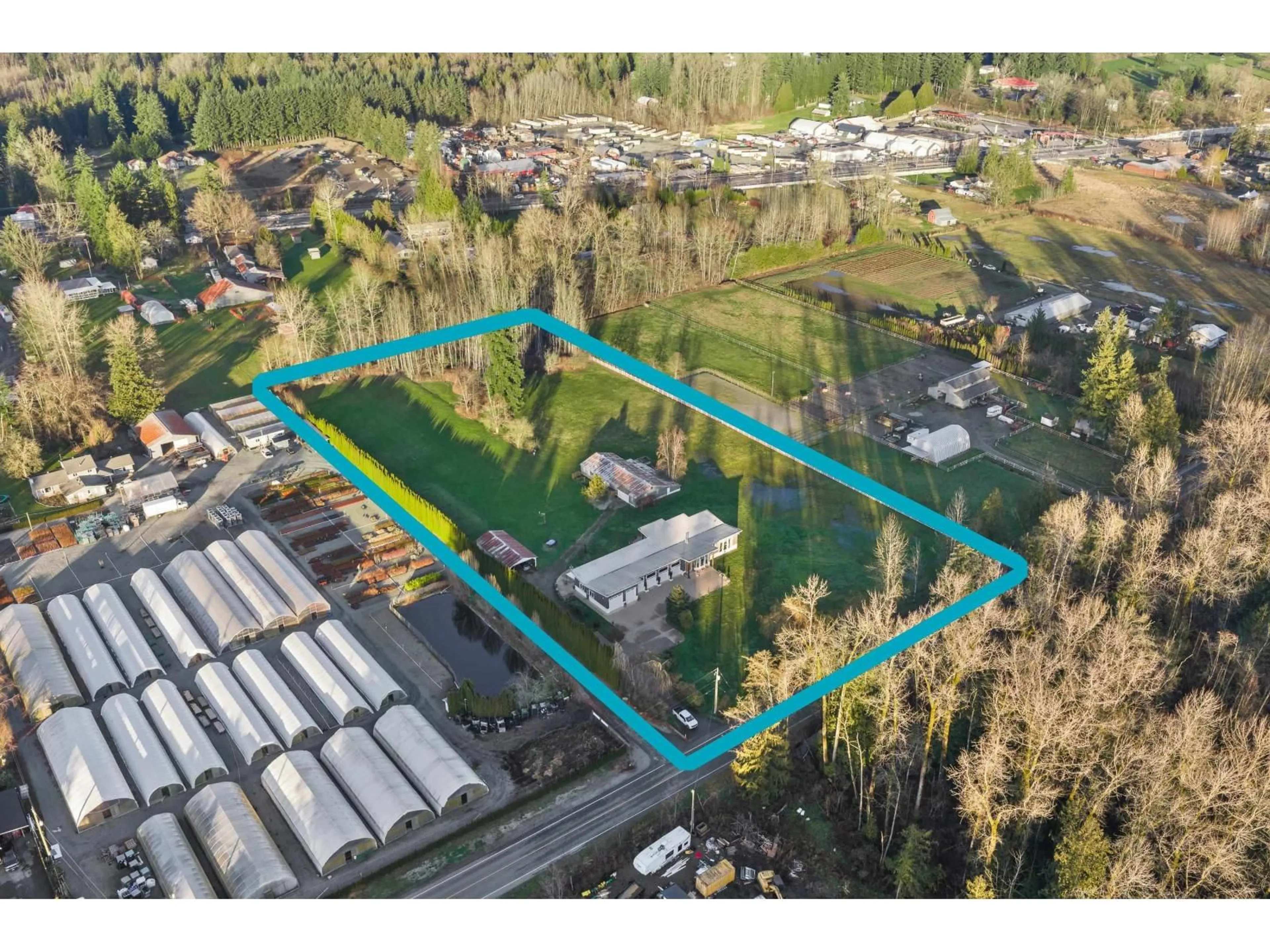 A pic from outside/outdoor area/front of a property/back of a property/a pic from drone, street for 24509 36 AVENUE, Langley British Columbia V2Z1J2