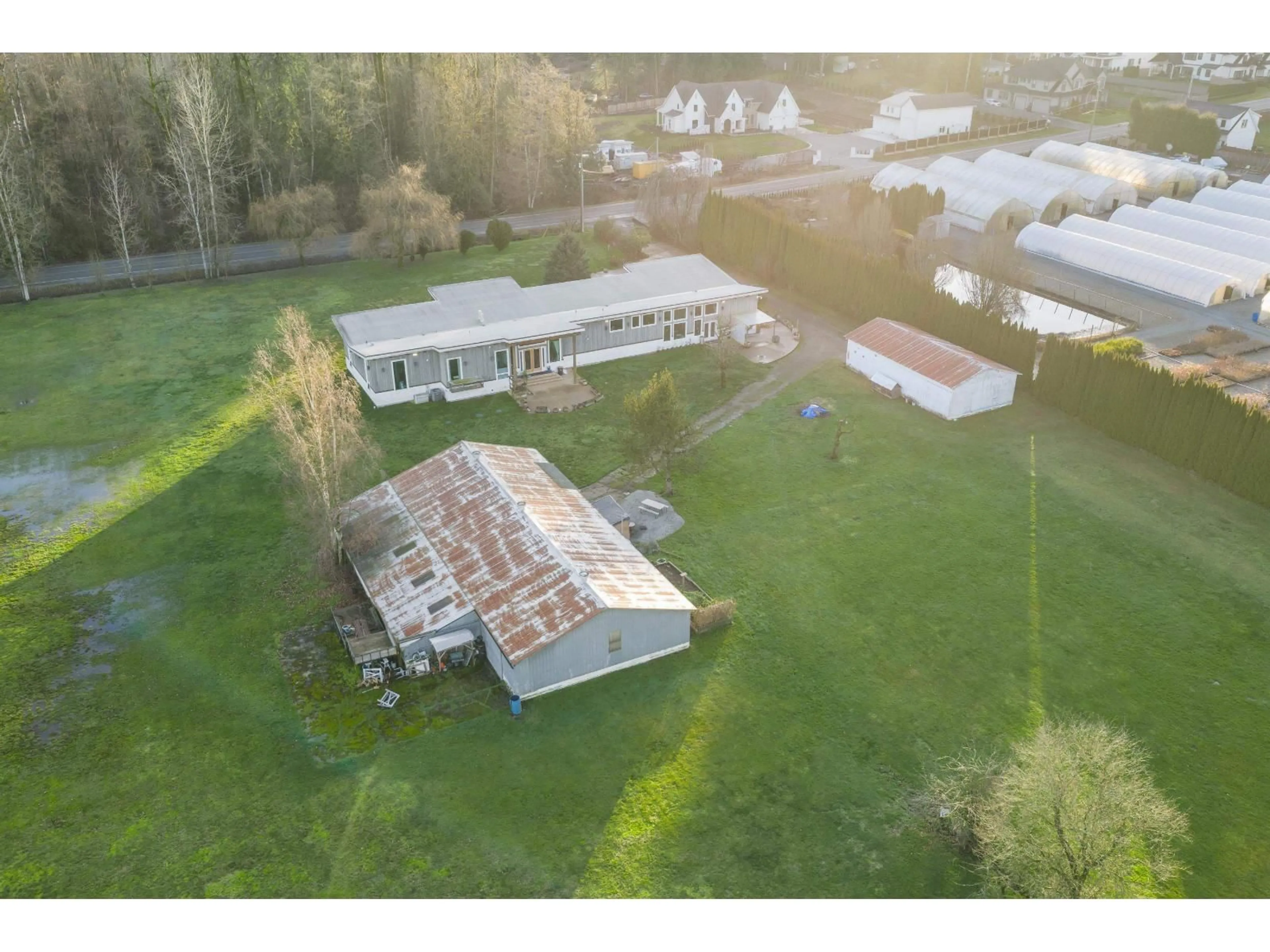 A pic from outside/outdoor area/front of a property/back of a property/a pic from drone, building for 24509 36 AVENUE, Langley British Columbia V2Z1J2