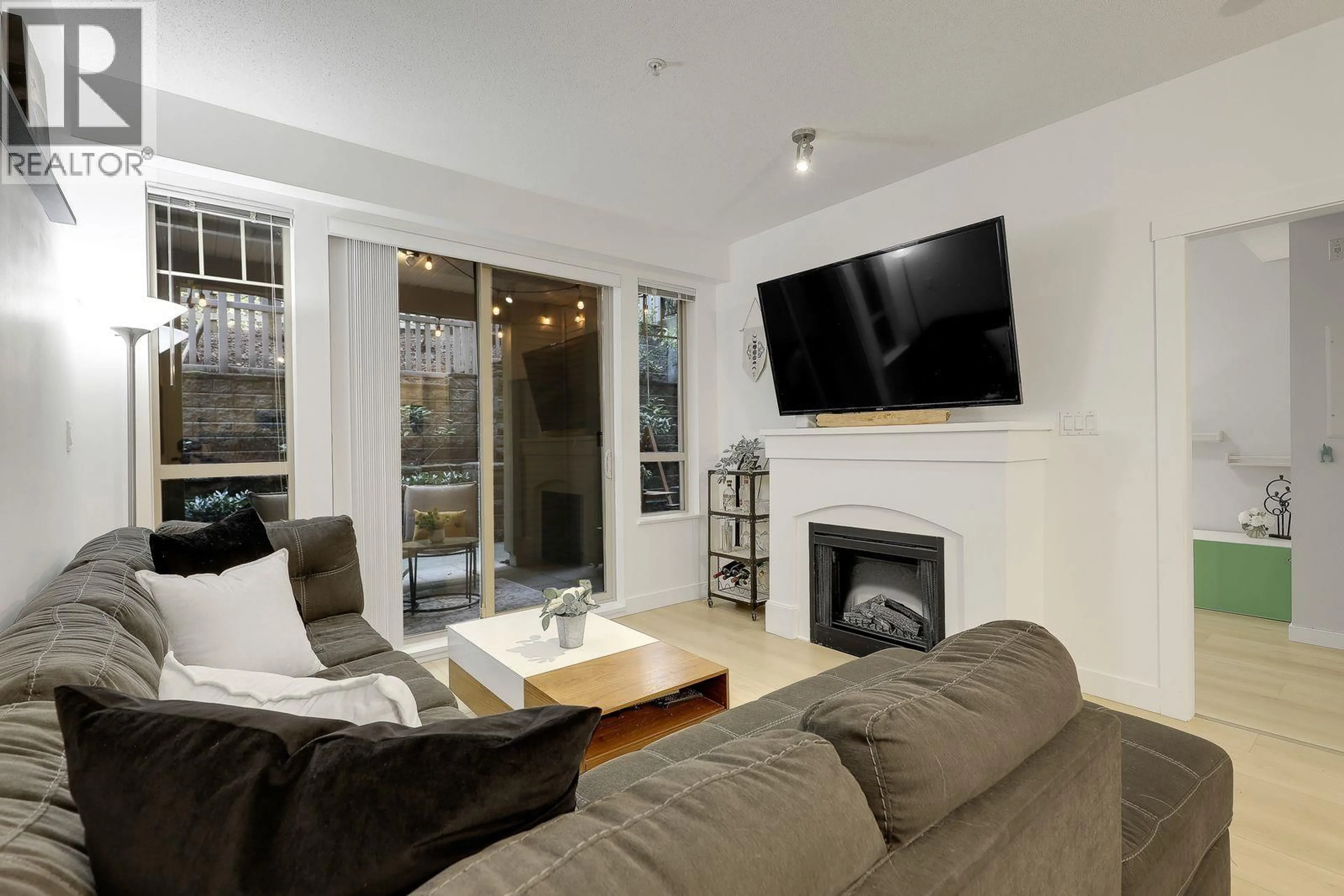 Living room with furniture, unknown for #106 - 2959 SILVER SPRINGS BOULEVARD, Coquitlam British Columbia V3E3S5