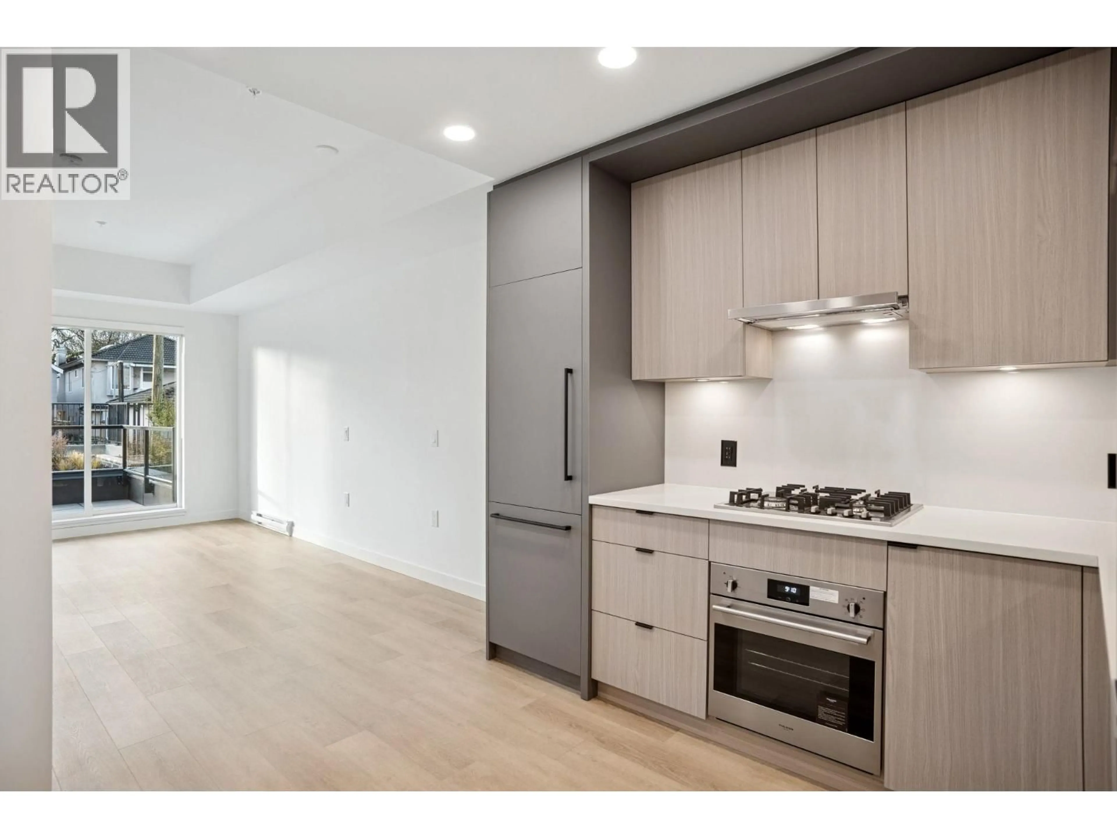 Open concept kitchen, unknown for 104 - 2268 BROADWAY, Vancouver British Columbia V5N0L2