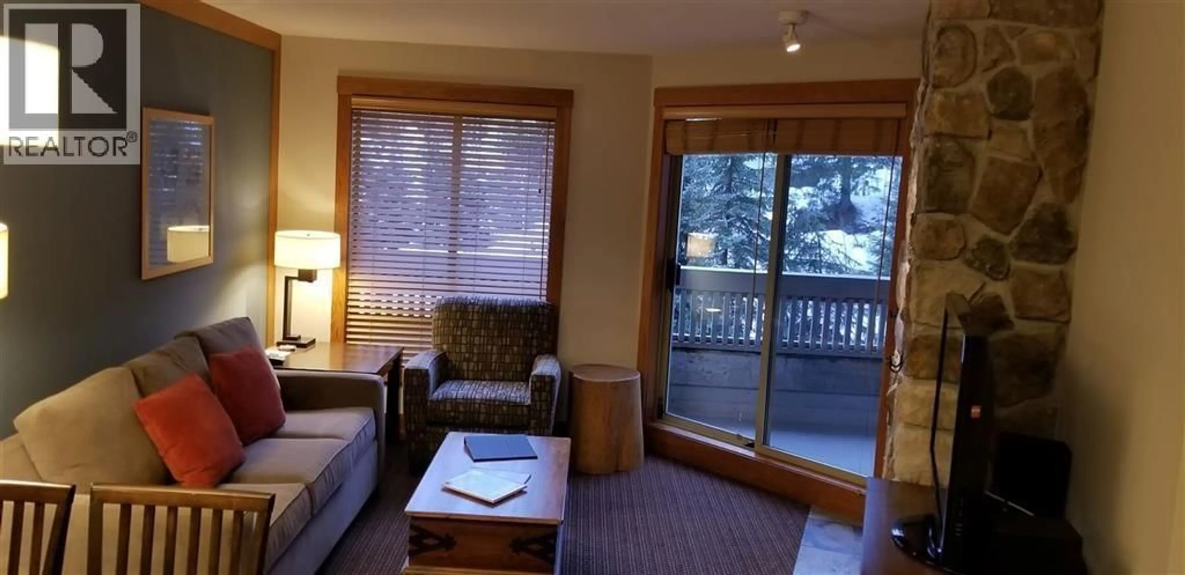 Living room with furniture, wood/laminate floor for 218C - 2036 LONDON LANE, Whistler British Columbia V8E0B6