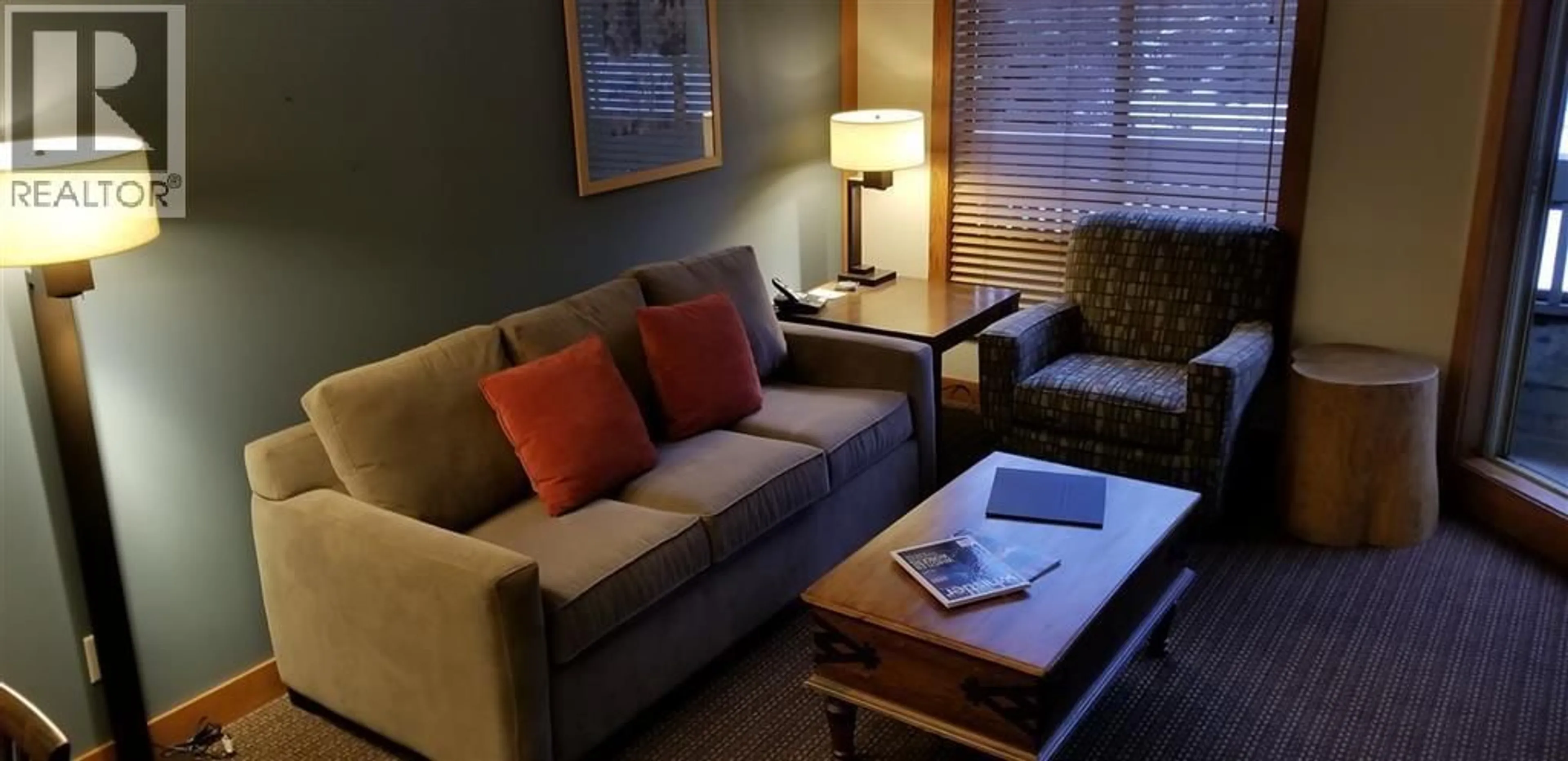 Living room with furniture, wood/laminate floor for 218C - 2036 LONDON LANE, Whistler British Columbia V8E0B6