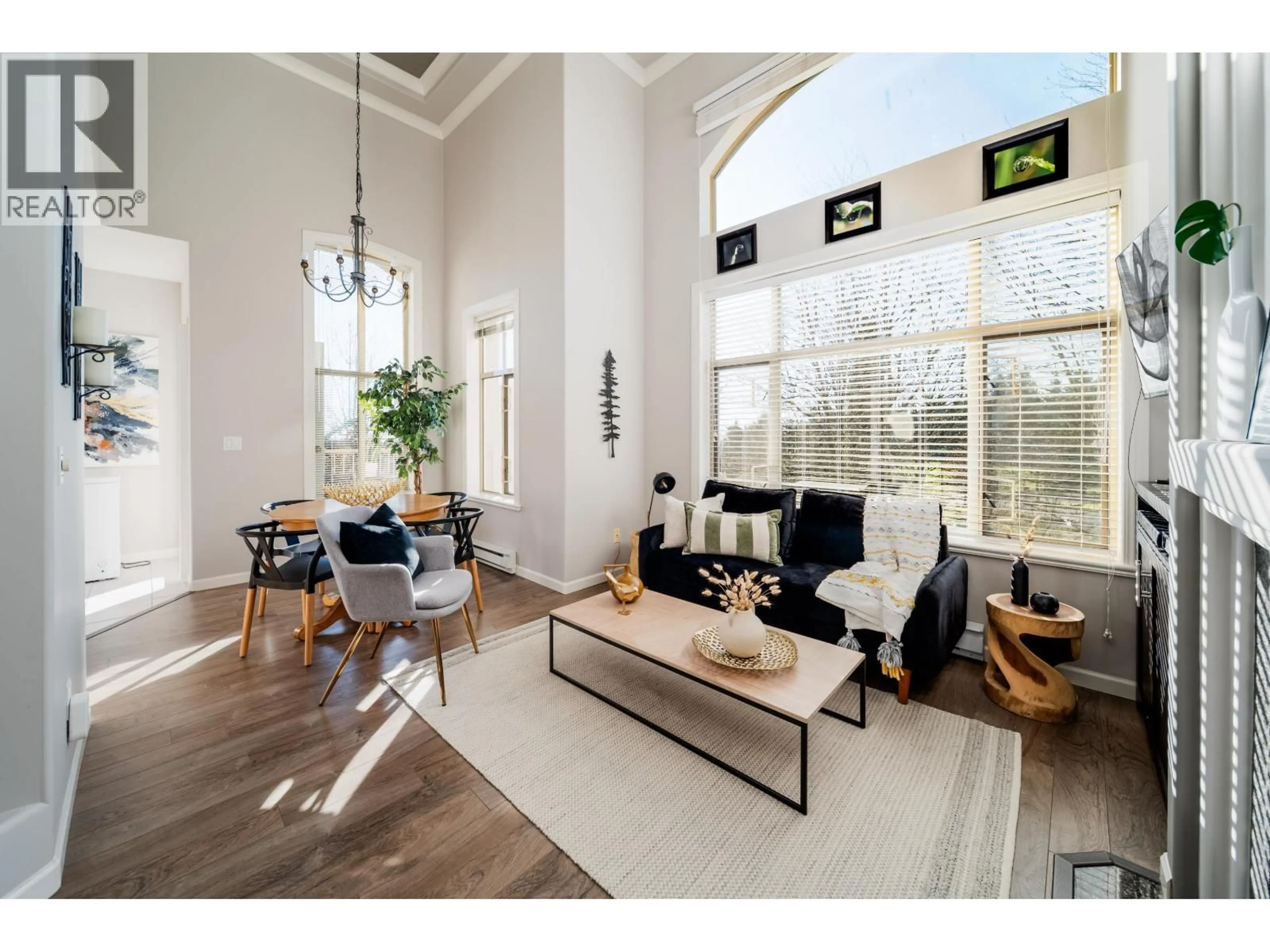 Living room with furniture, wood/laminate floor for 314 - 3176 PLATEAU BOULEVARD, Coquitlam British Columbia V3E3J2