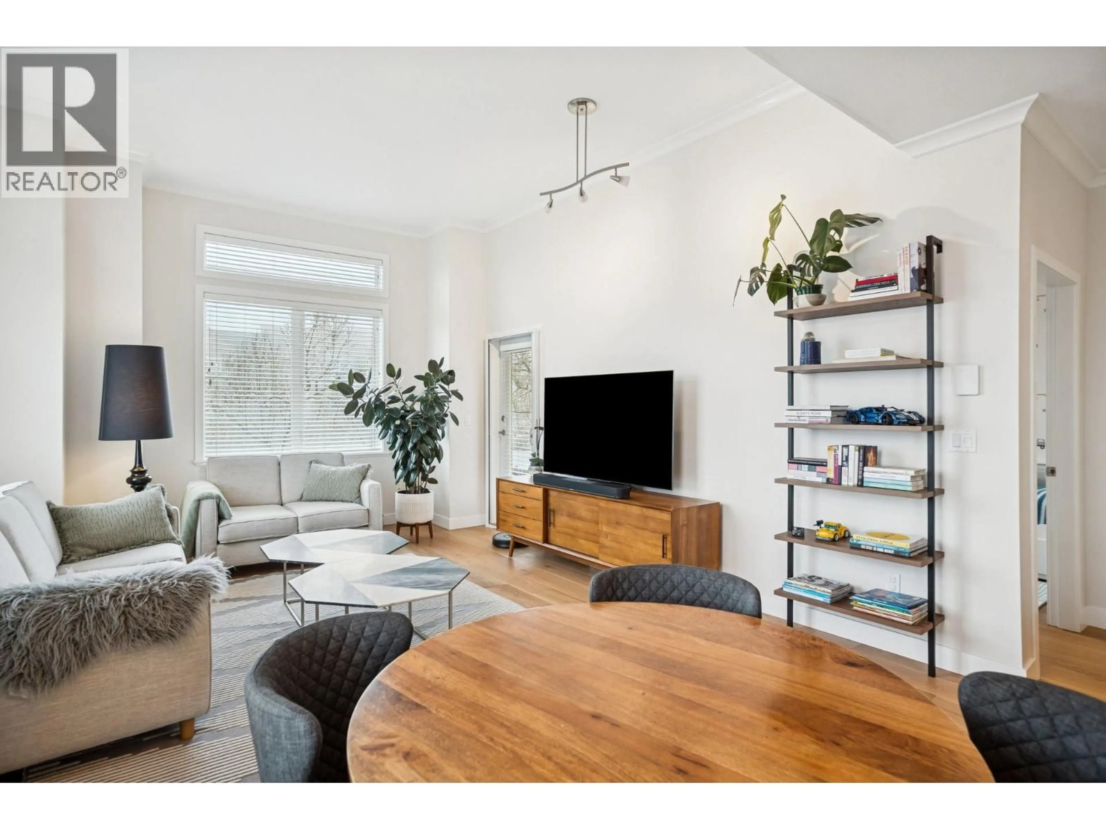 Living room with furniture, wood/laminate floor for 304 - 1375 VIEW CRESCENT, Delta British Columbia V4L0A3