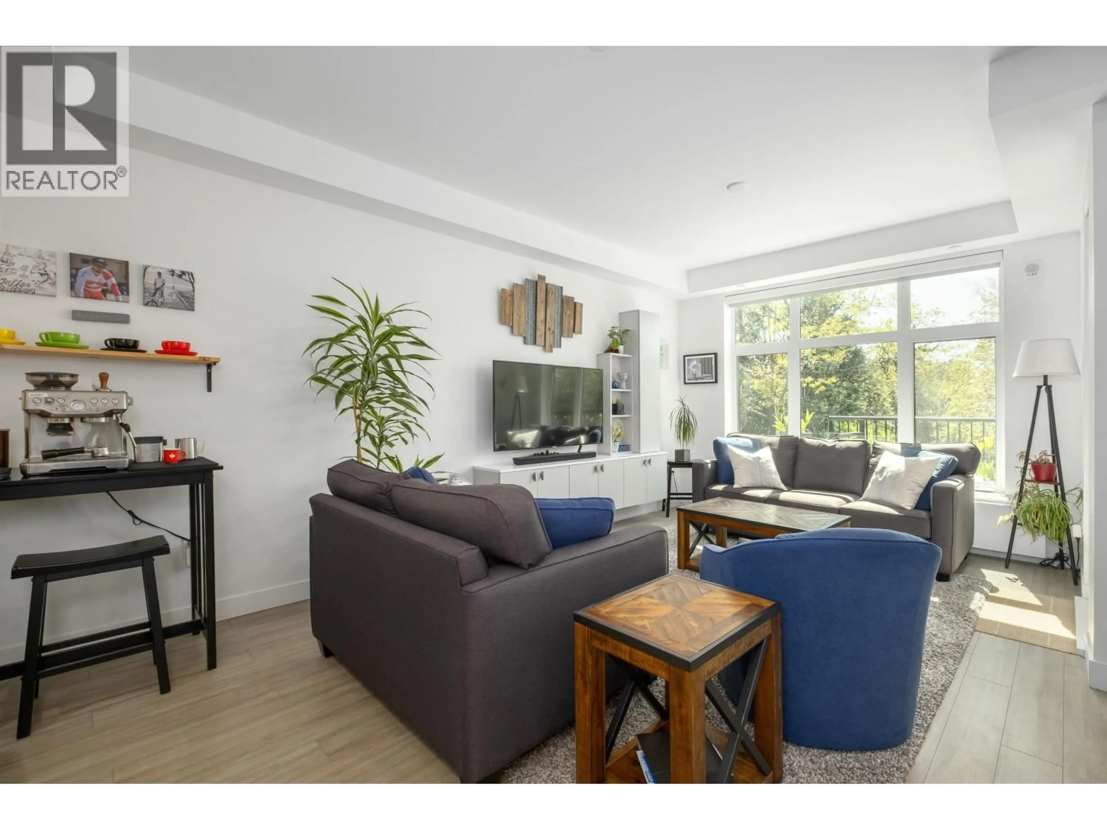 Living room with furniture, wood/laminate floor for 111 - 747 3RD STREET, North Vancouver British Columbia V7L1G8