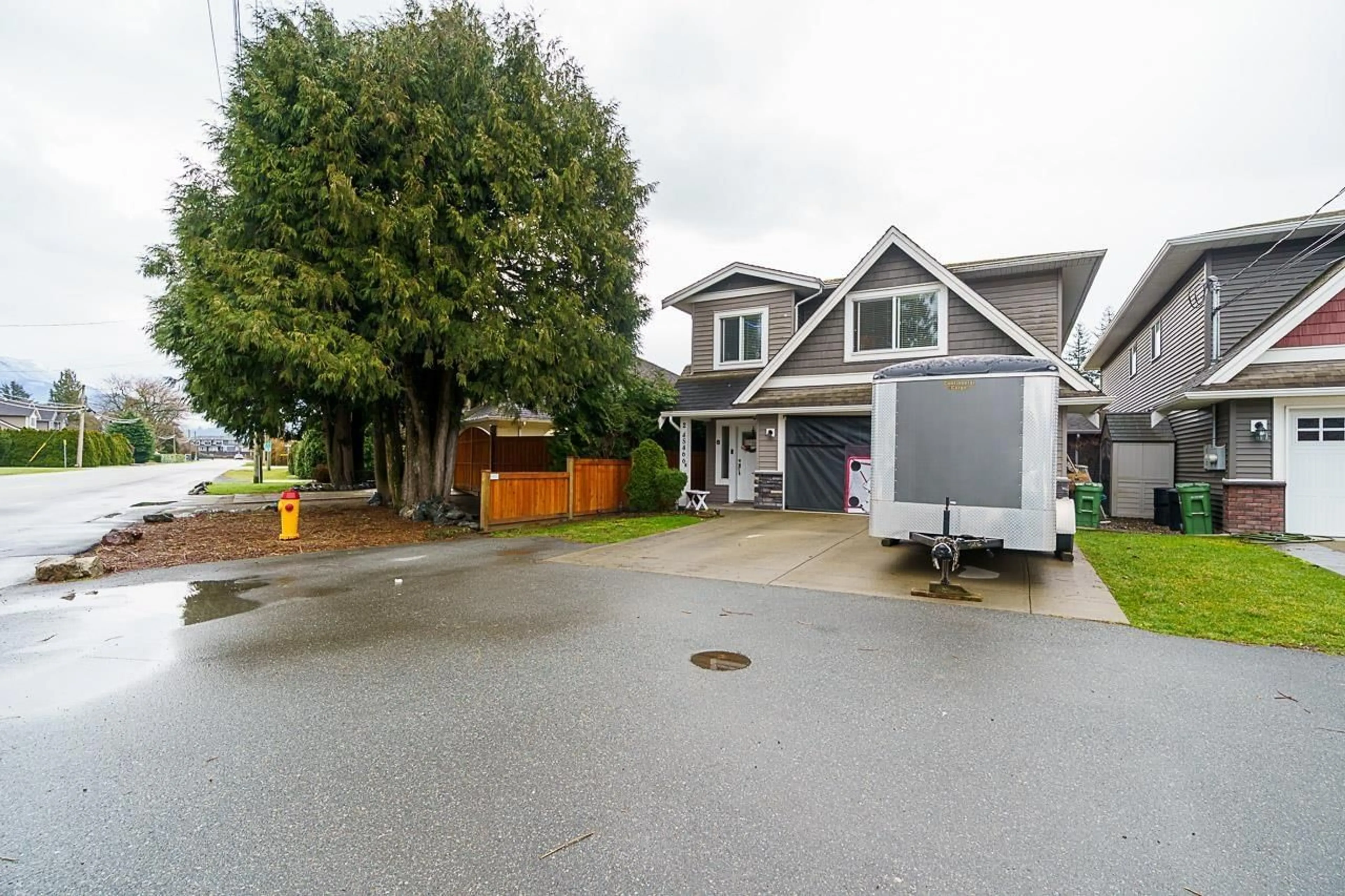 A pic from outside/outdoor area/front of a property/back of a property/a pic from drone, street for 2 - 45466 WELLS ROAD, Chilliwack British Columbia V2R1G6