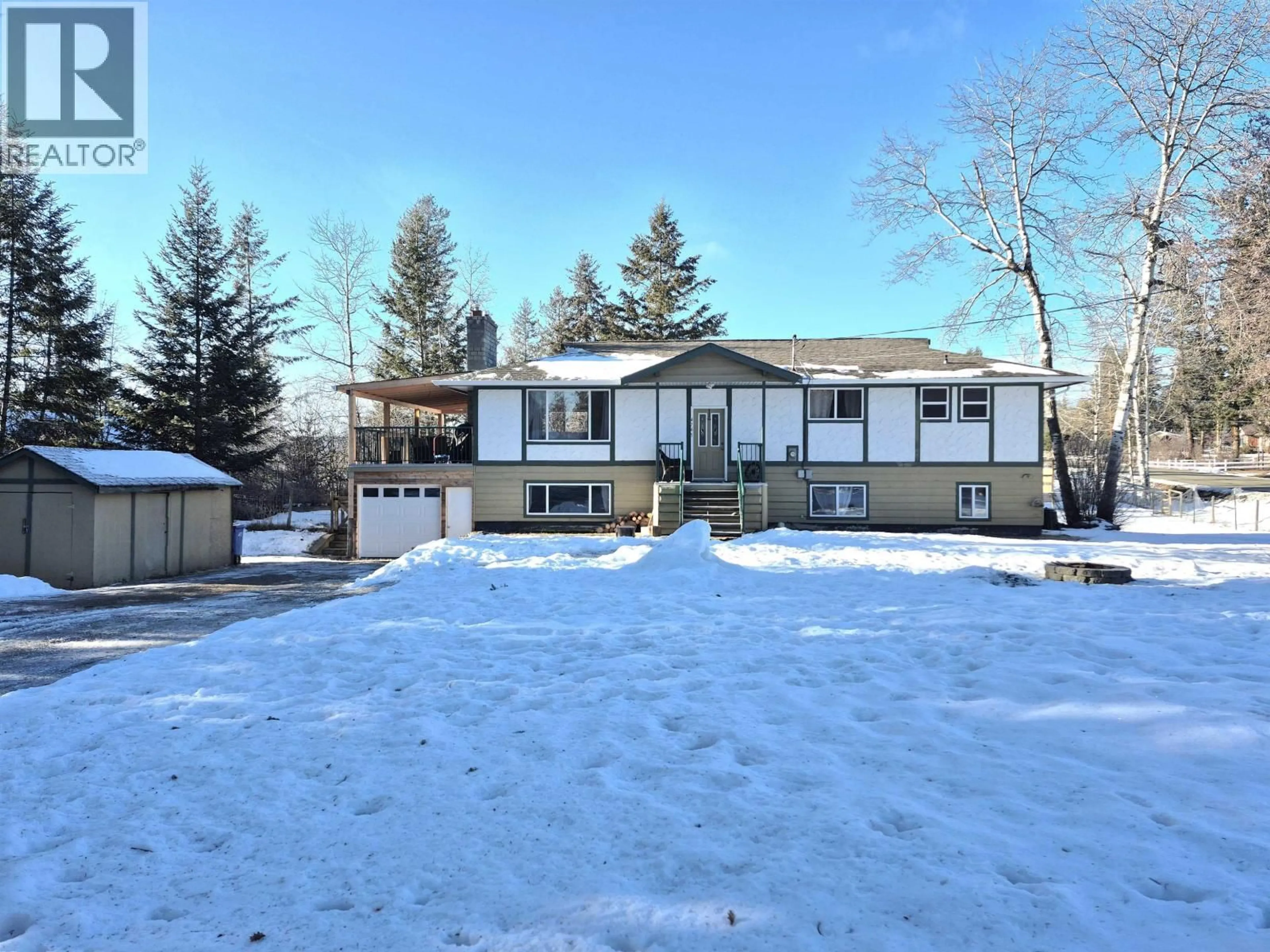 A pic from outside/outdoor area/front of a property/back of a property/a pic from drone, street for 4765 CHILCOTIN CRESCENT, 108 Mile Ranch British Columbia V0K2Z0