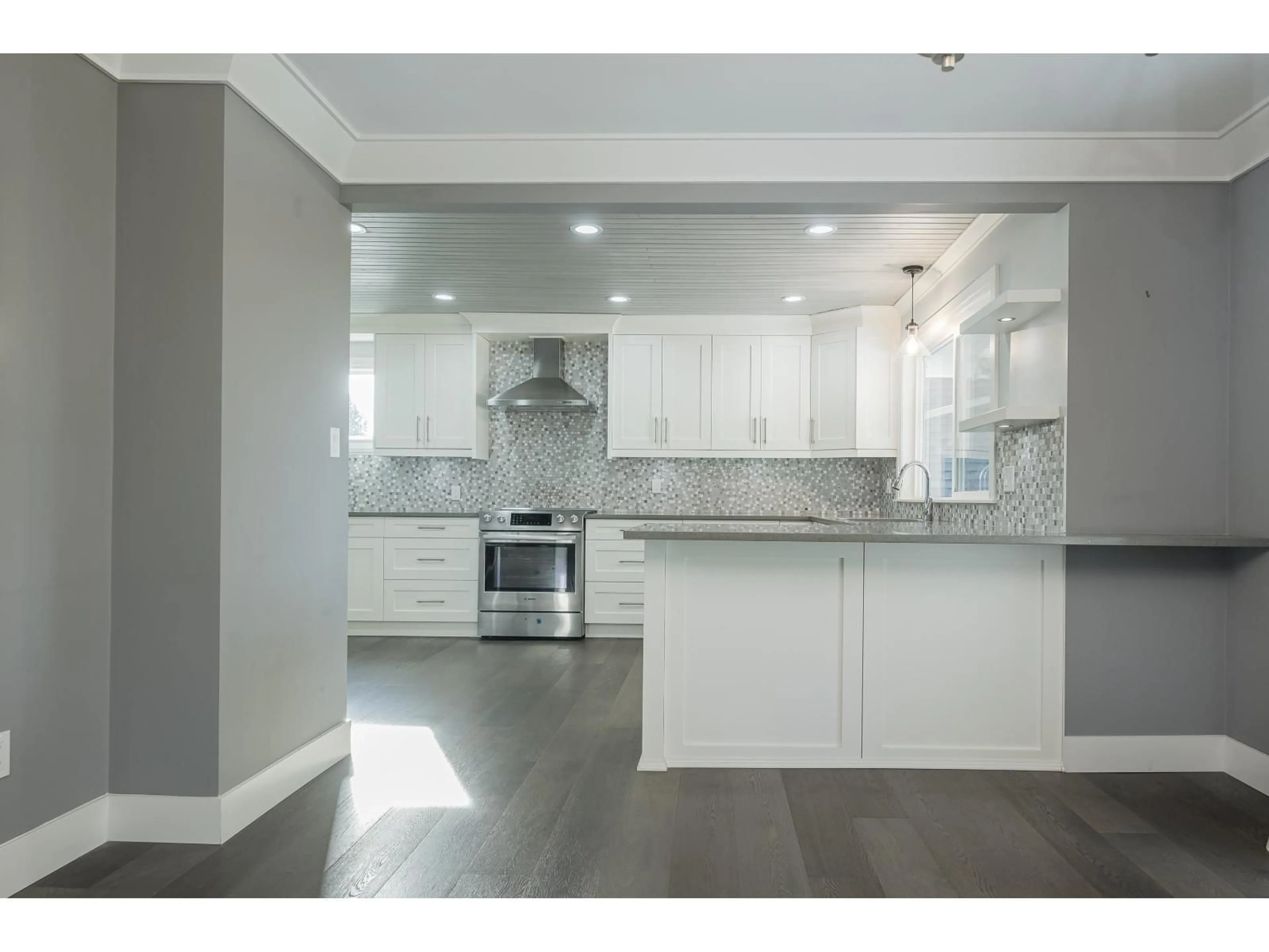 Open concept kitchen, ceramic/tile floor for 21793 48A AVENUE, Langley British Columbia V3A3P7