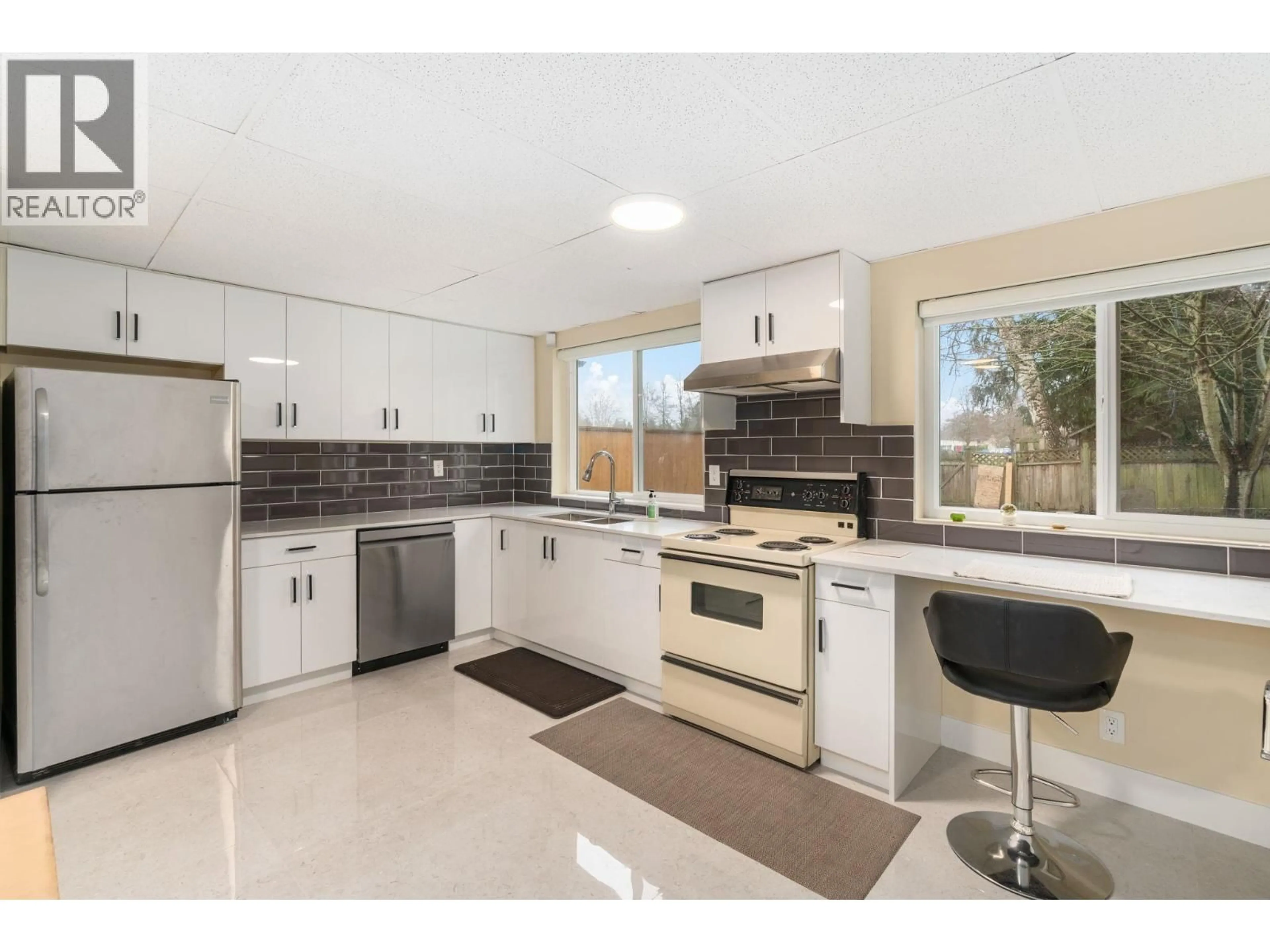 Open concept kitchen, ceramic/tile floor for 9580 SEACOTE ROAD, Richmond British Columbia V7A4A1