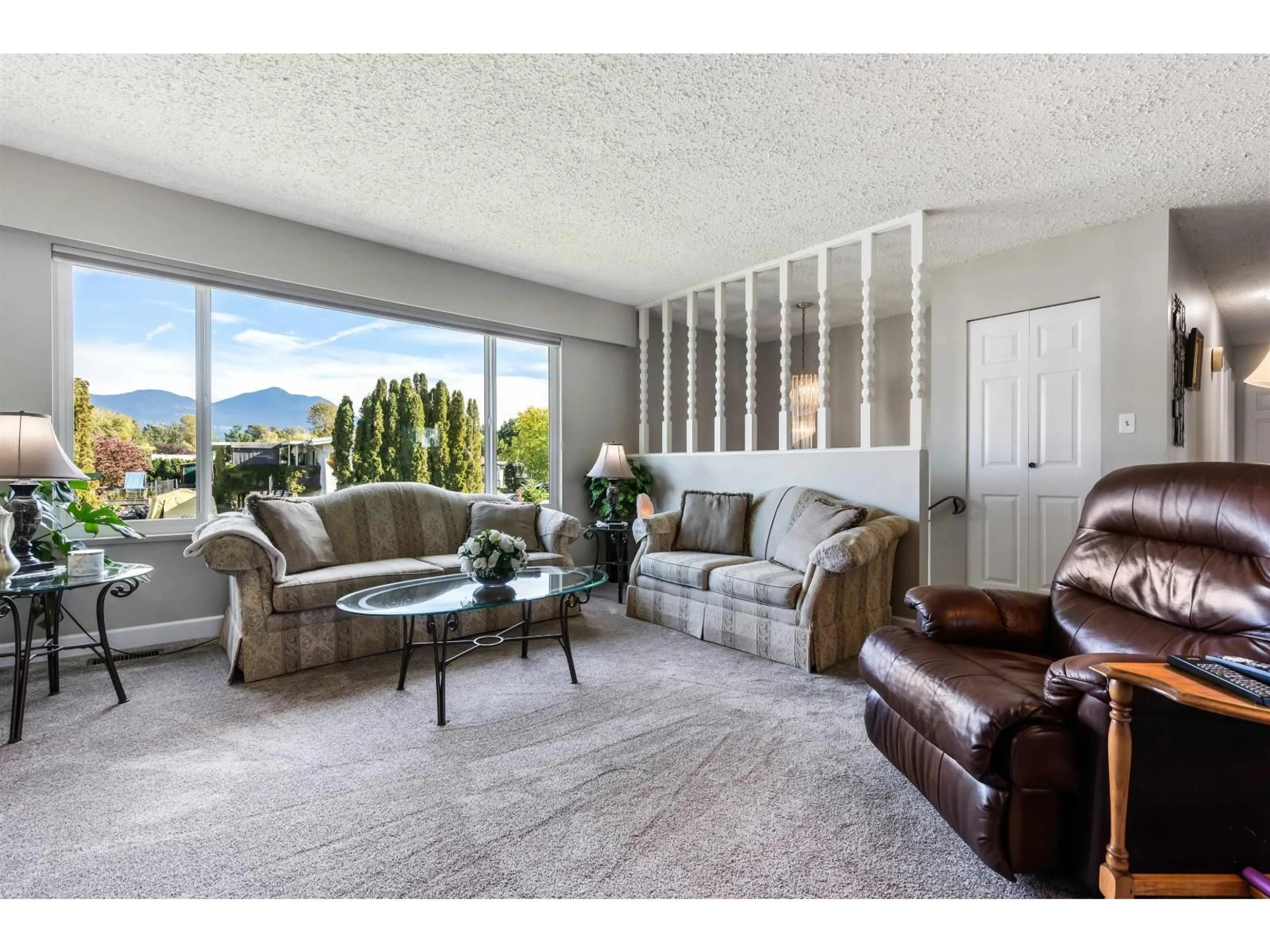 Living room with furniture, unknown for 6961 SHEFFIELD WAY, Chilliwack British Columbia V2R3T2