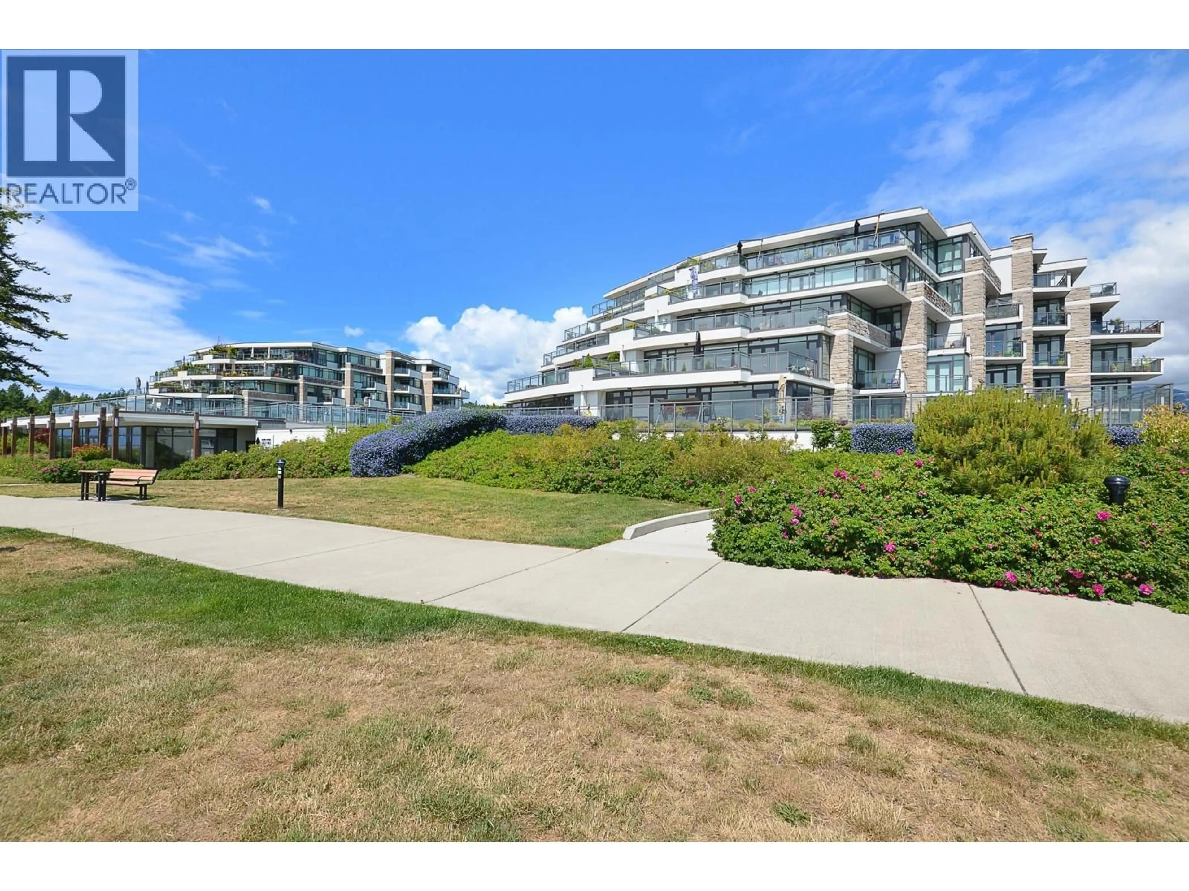 A pic from outside/outdoor area/front of a property/back of a property/a pic from drone, water/lake/river/ocean view for 306 - 5665 TEREDO STREET, Sechelt British Columbia V7Z0J2