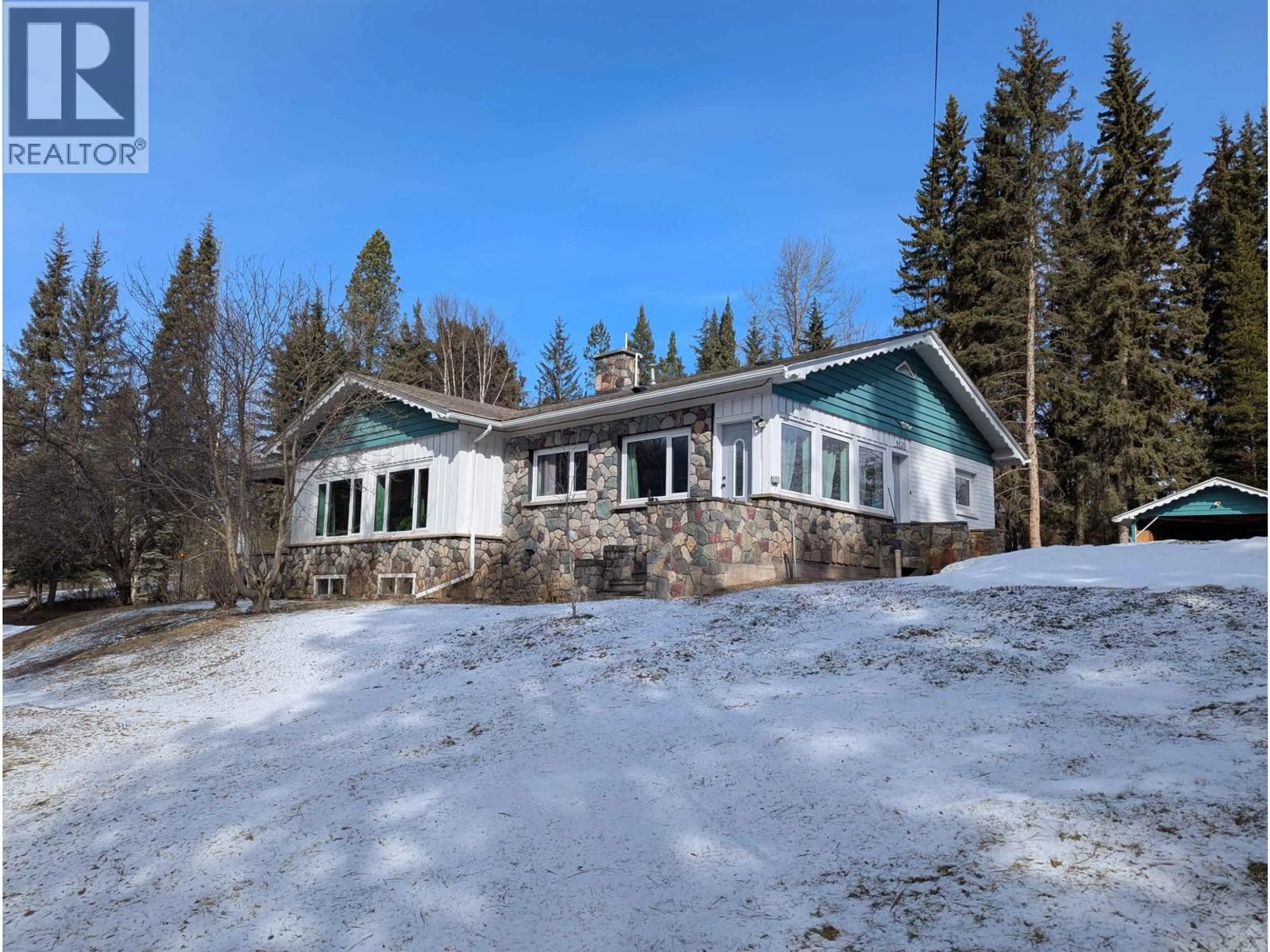 A pic from outside/outdoor area/front of a property/back of a property/a pic from drone, building for 4620 MANTON ROAD, Smithers British Columbia V0J2N0