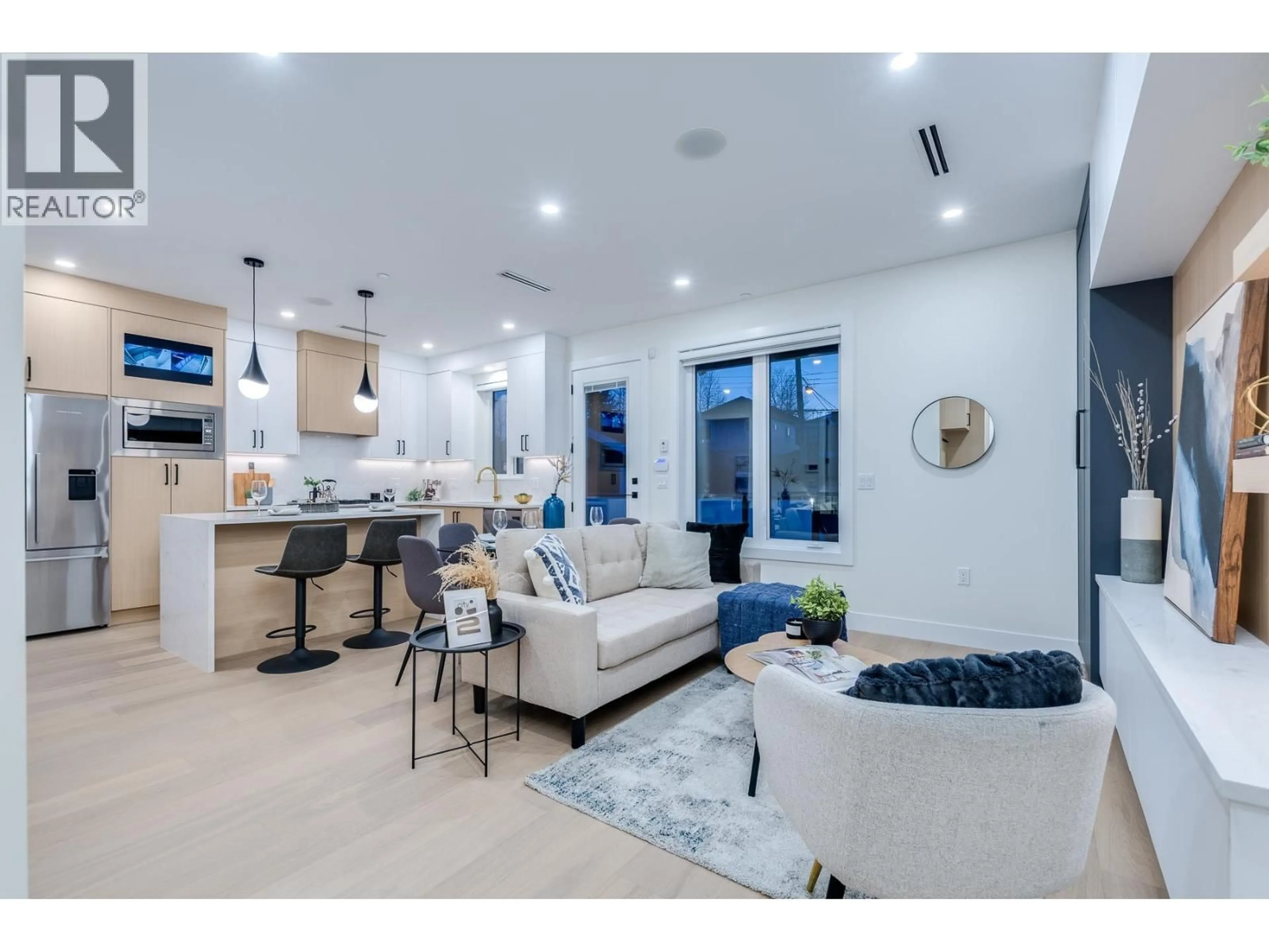 Open concept kitchen, ceramic/tile floor for 1 - 5459 RHODES STREET, Vancouver British Columbia V5R3P1