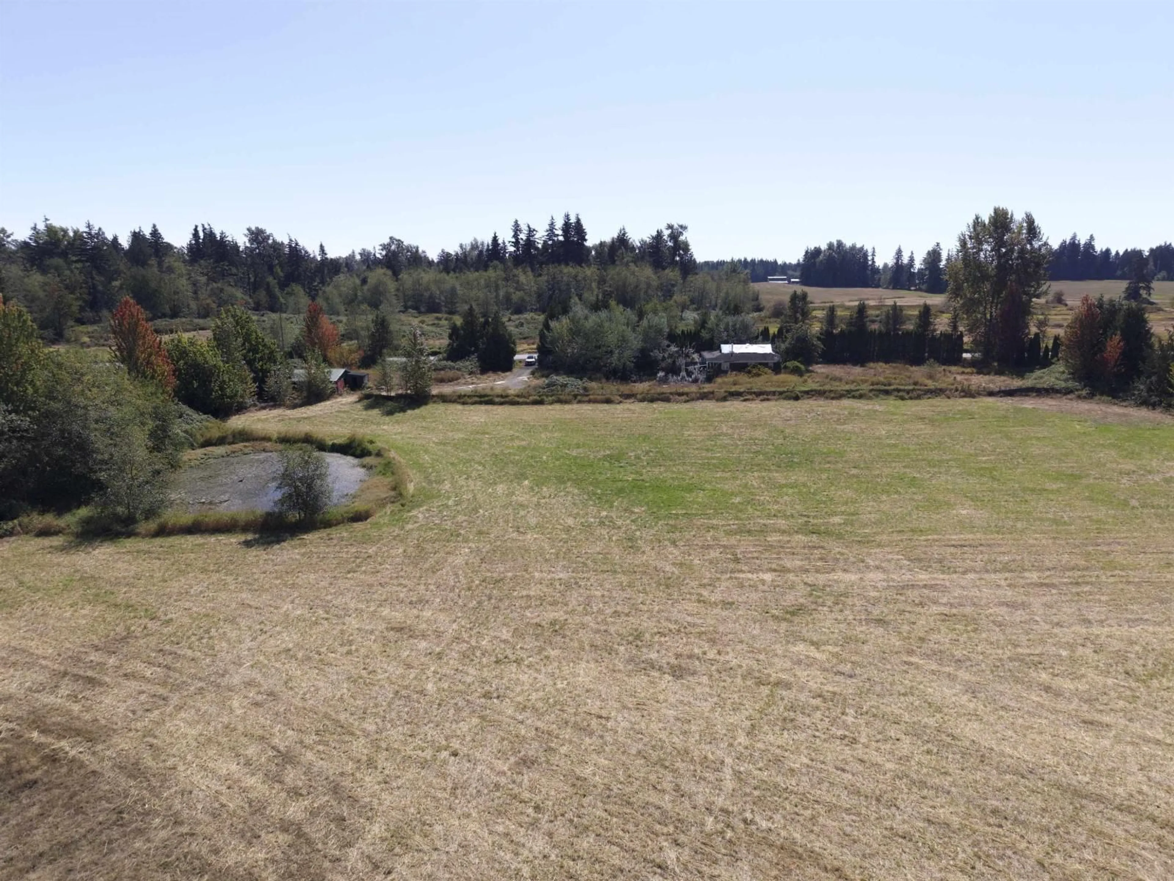 A pic from outside/outdoor area/front of a property/back of a property/a pic from drone, water/lake/river/ocean view for 24493 0 AVENUE, Langley British Columbia V2Z2Y7