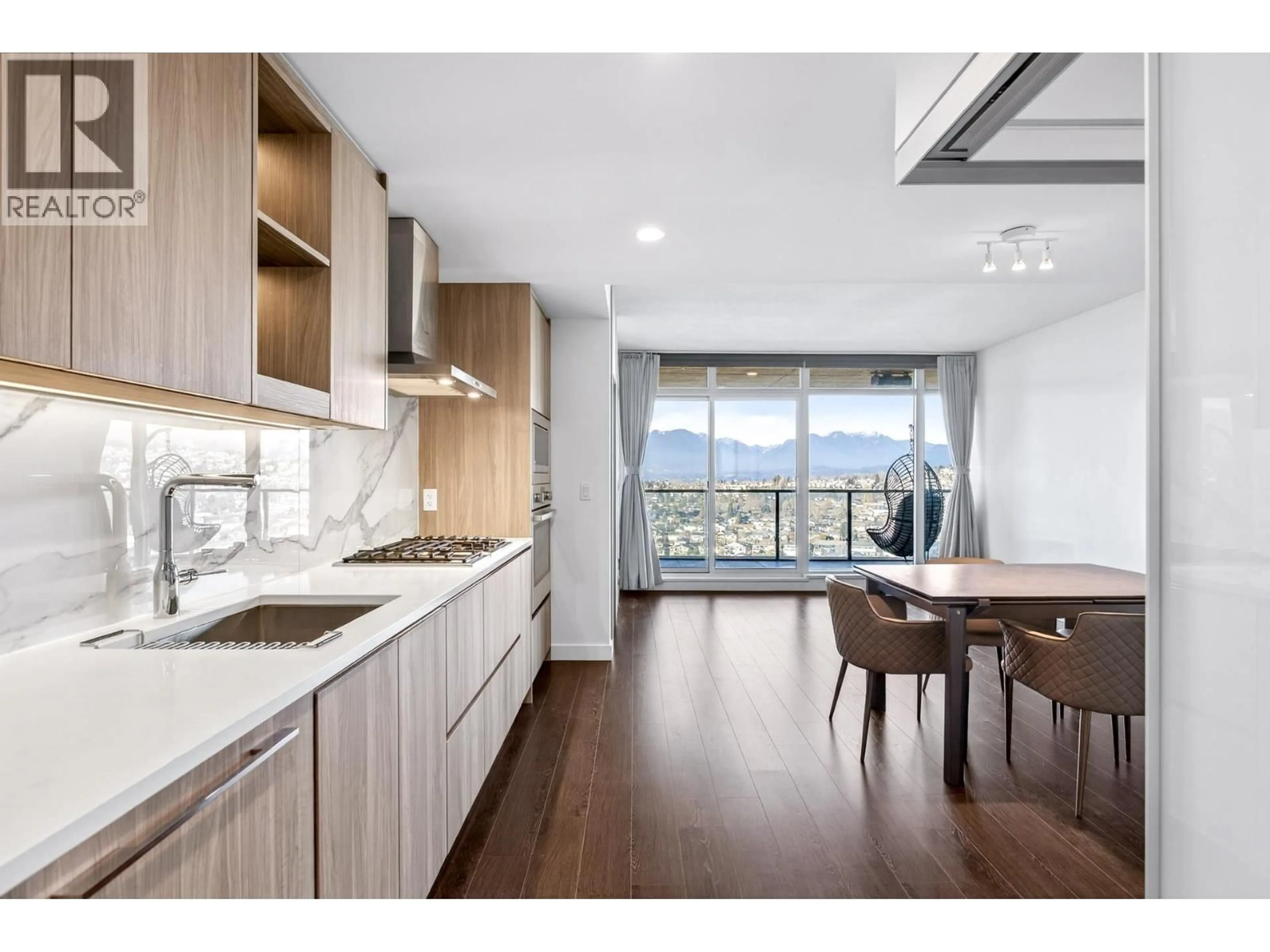 Open concept kitchen, wood/laminate floor for 2603 - 4880 LOUGHEED HIGHWAY, Burnaby British Columbia V5C0N1