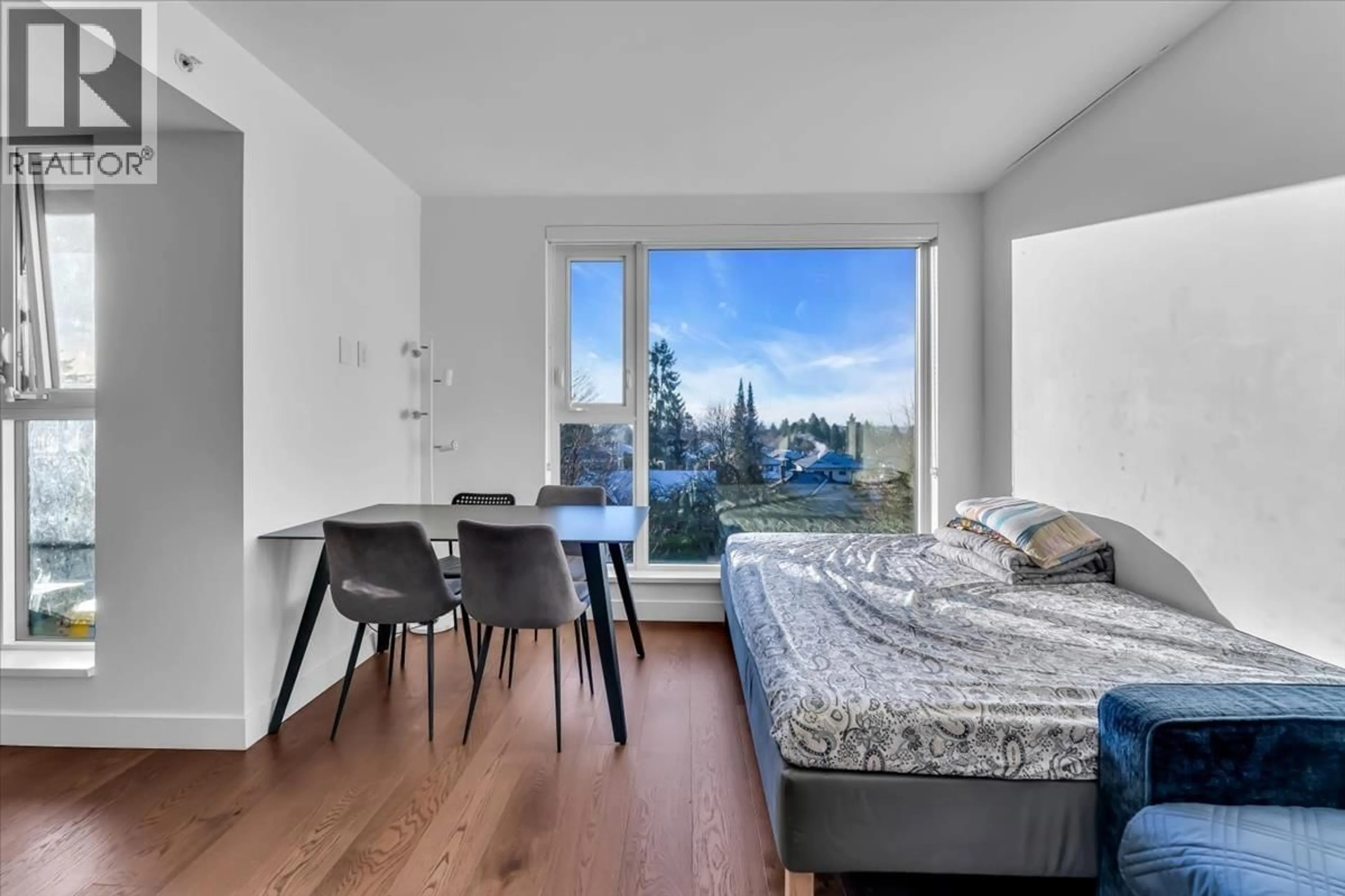 Bedroom with bed, wood/laminate floor for 607 - 1571 57TH AVENUE, Vancouver British Columbia V6P0H7