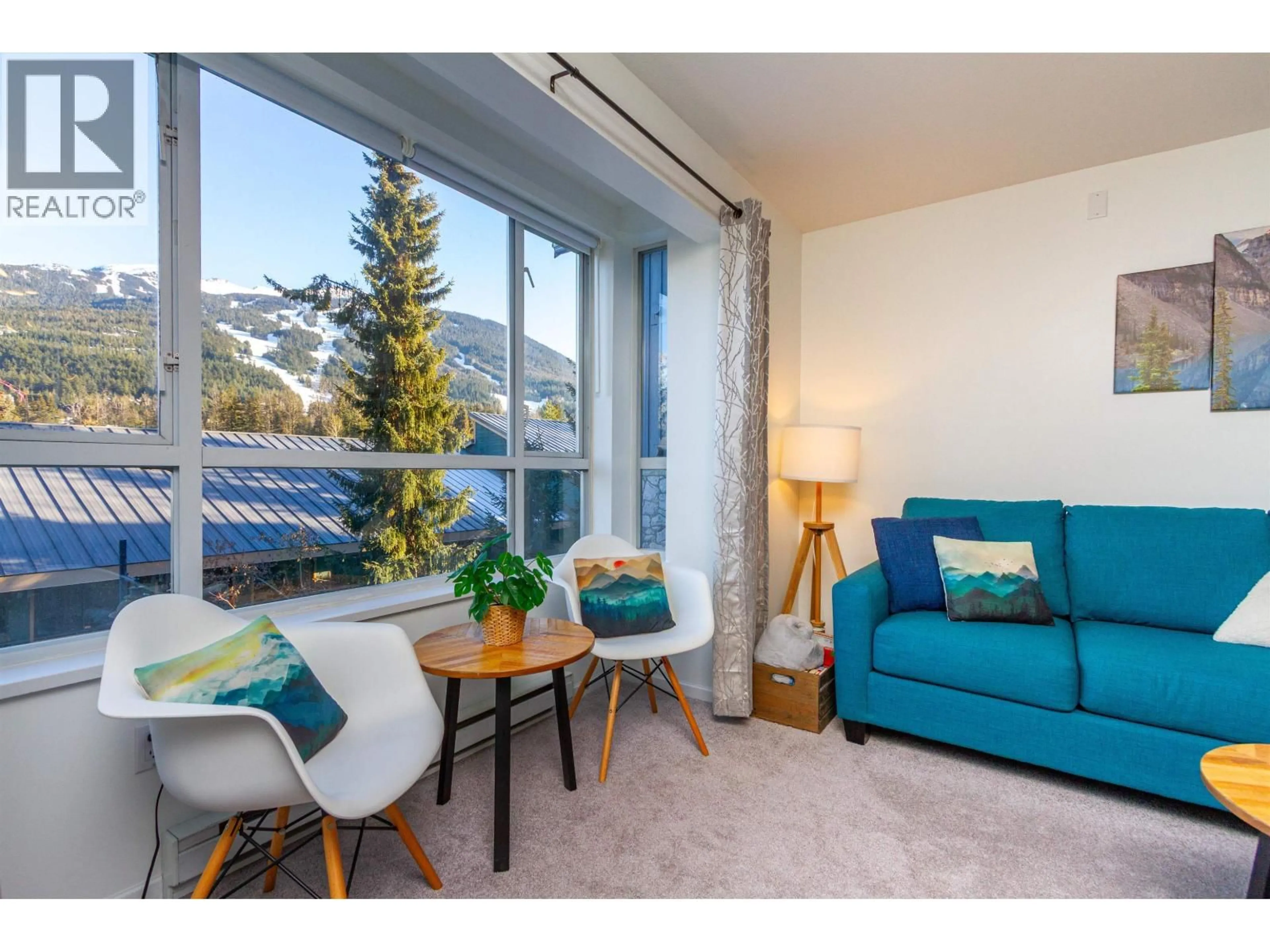 Living room with furniture, wood/laminate floor for 336 - 4314 MAIN STREET, Whistler British Columbia V8E1A8