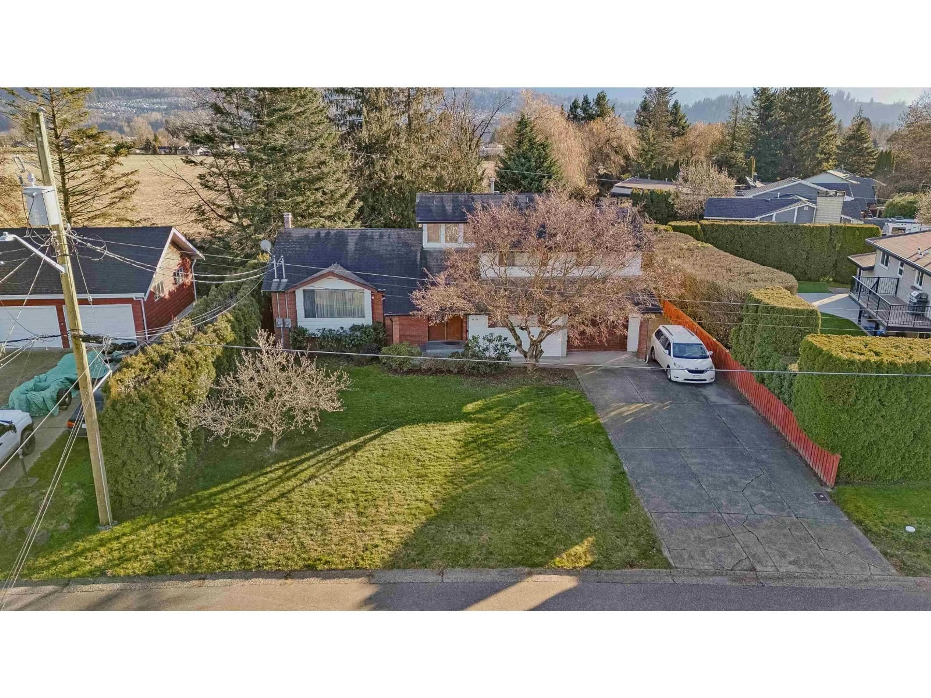 A pic from outside/outdoor area/front of a property/back of a property/a pic from drone, street for 46194 GREENWOOD DRIVE, Chilliwack British Columbia V2R4C8