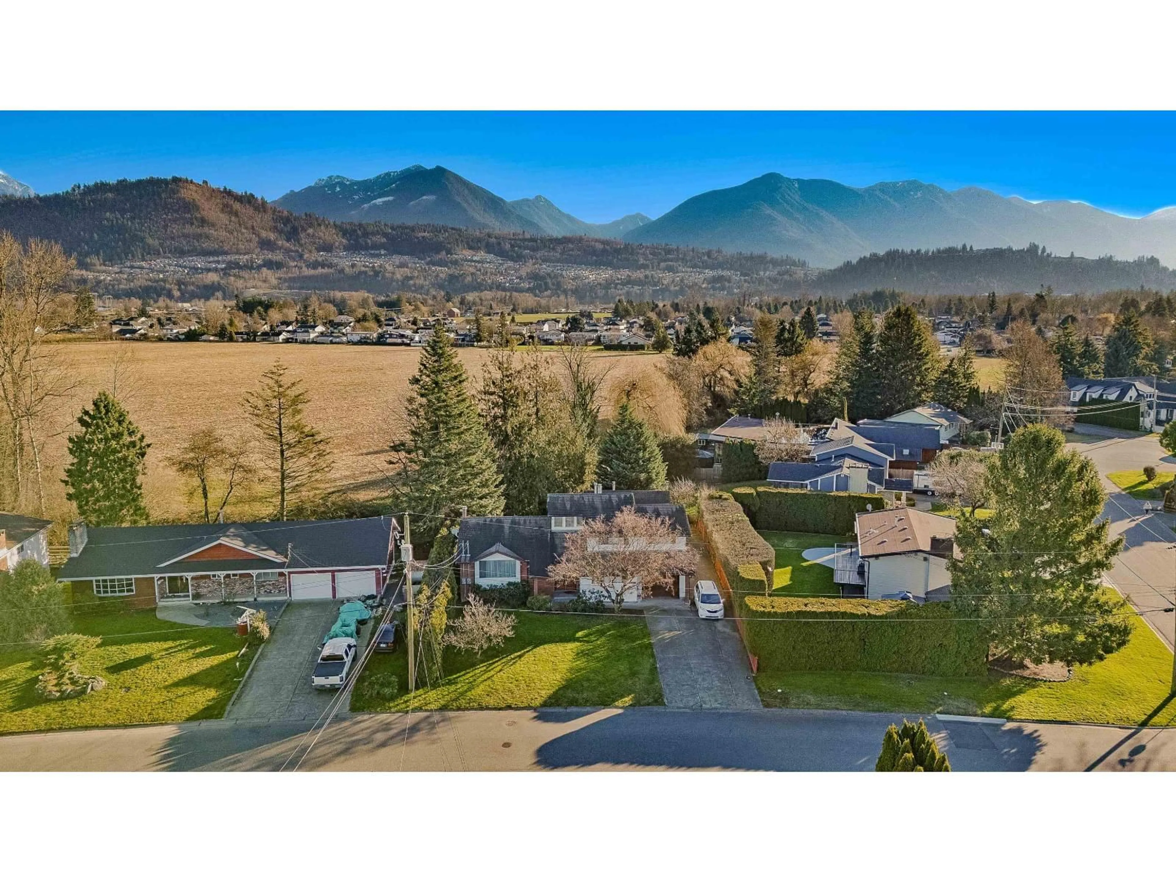 A pic from outside/outdoor area/front of a property/back of a property/a pic from drone, mountain view for 46194 GREENWOOD DRIVE, Chilliwack British Columbia V2R4C8