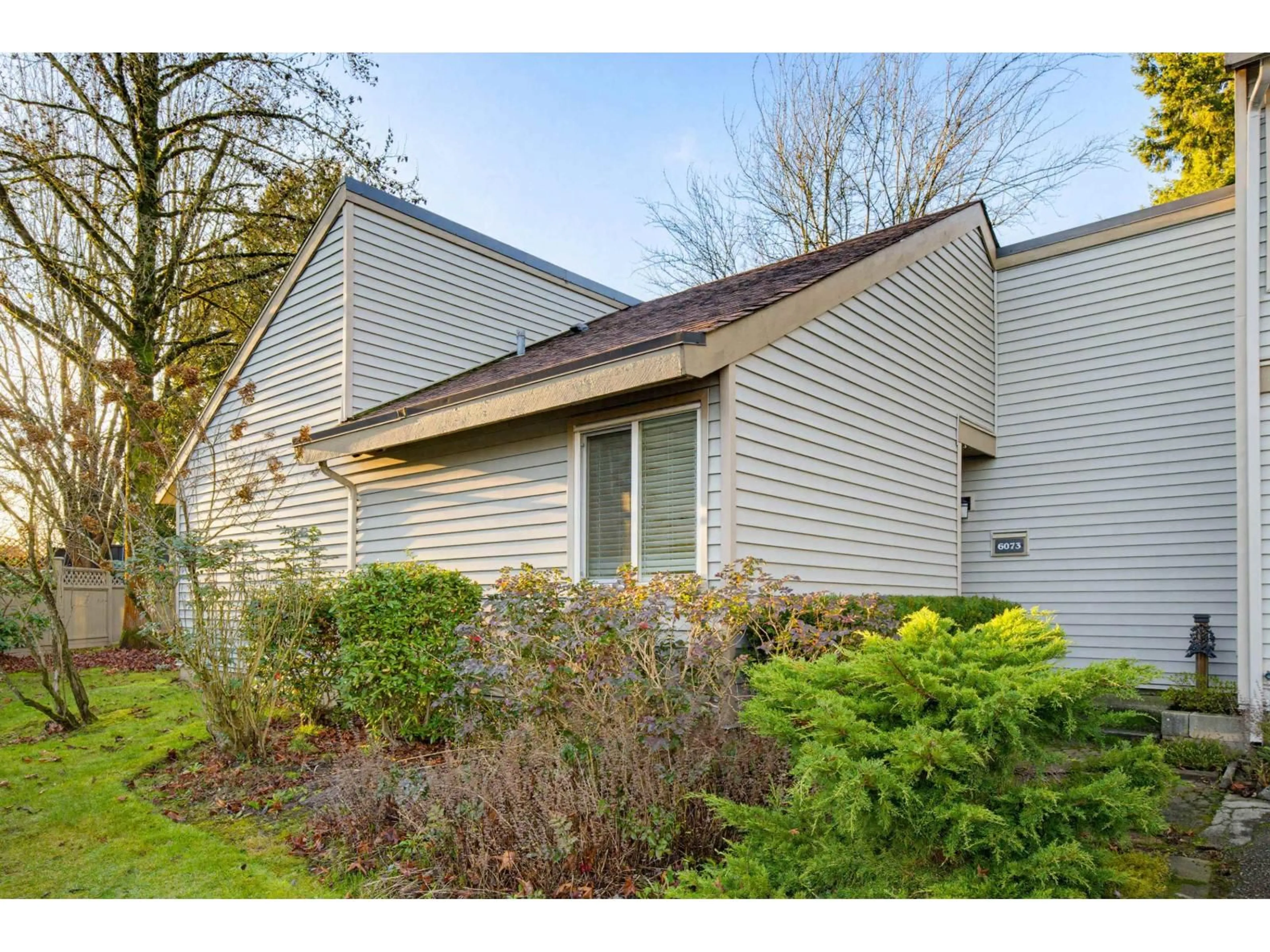 Home with vinyl exterior material, street for 6073 GREENSIDE DRIVE EAST, Surrey British Columbia V3S5M8