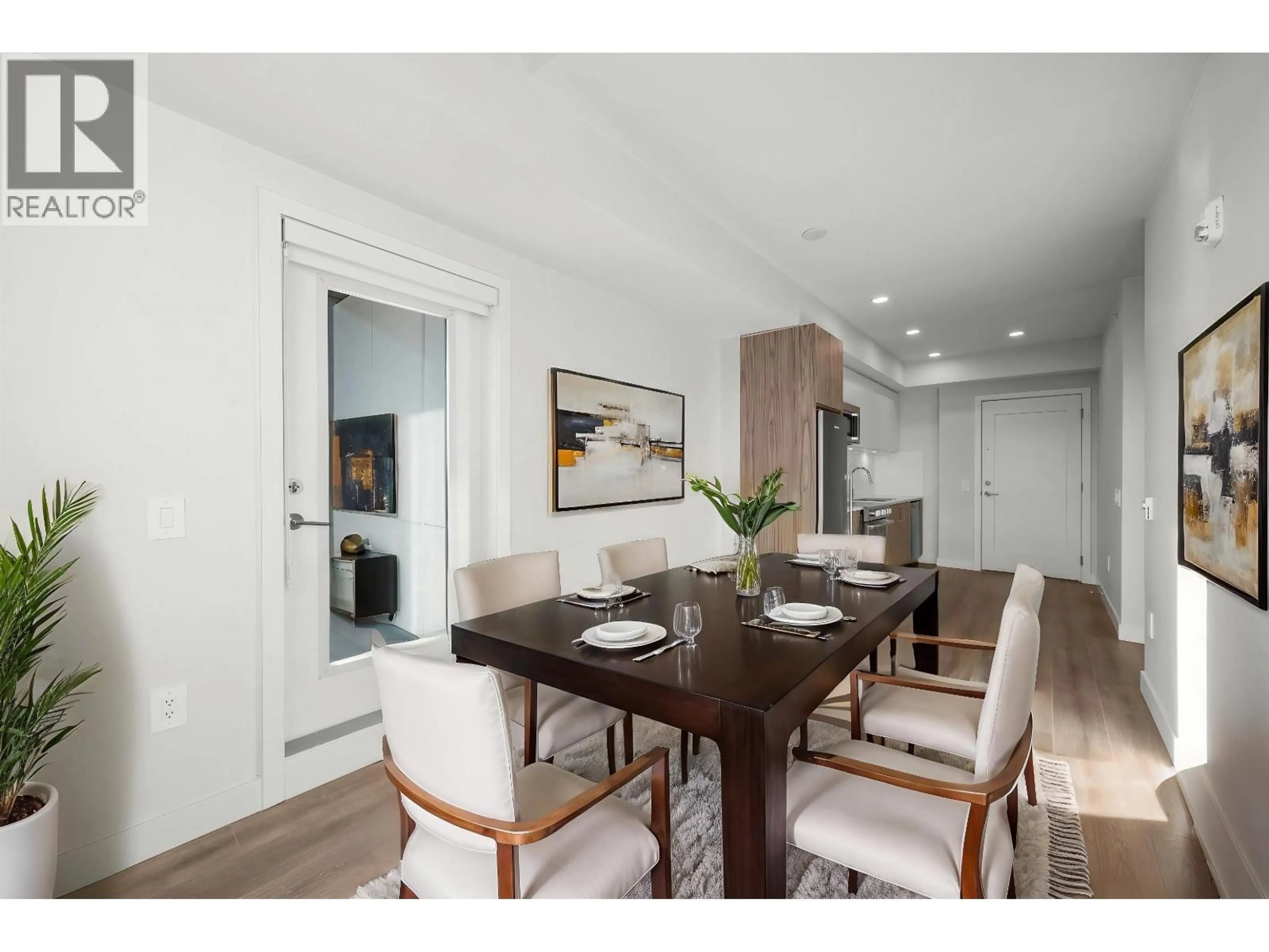 Dining room, wood/laminate floor for 405 - 5535 HASTINGS STREET, Burnaby British Columbia V5B1R2