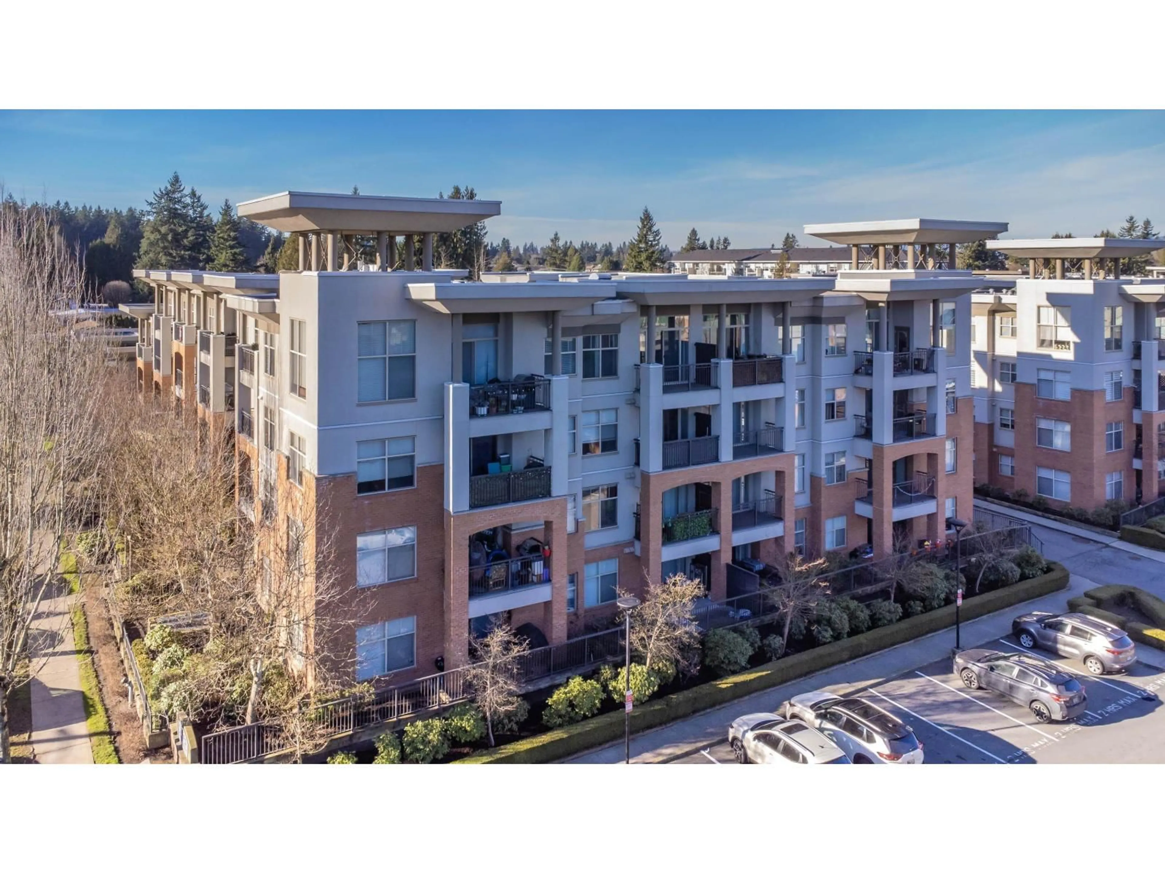 A pic from outside/outdoor area/front of a property/back of a property/a pic from drone, unknown for 406 - 33545 RAINBOW AVENUE, Abbotsford British Columbia V2S0B9