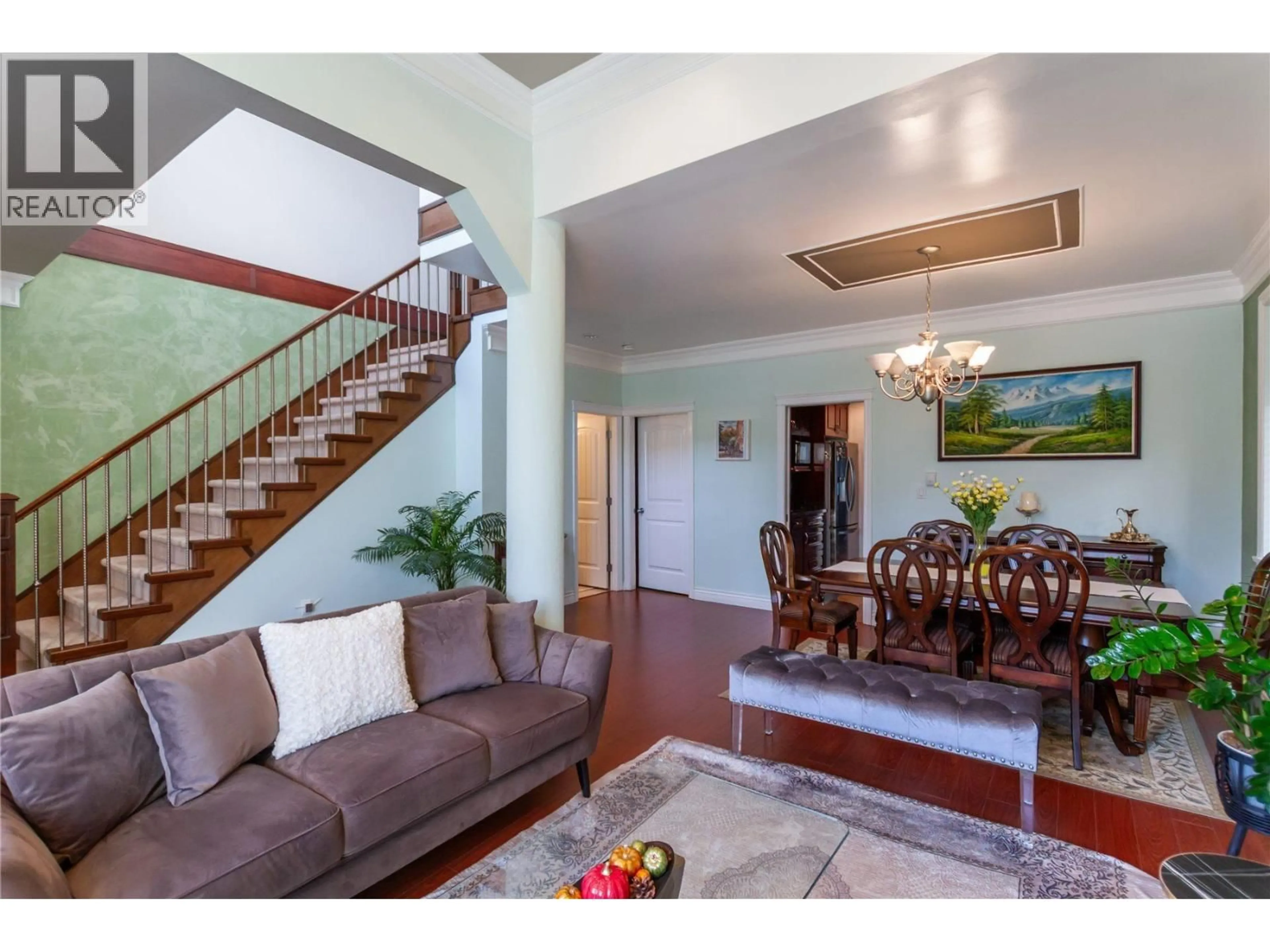 Living room with furniture, wood/laminate floor for 7751 ROSEWOOD STREET, Burnaby British Columbia V5E2H2