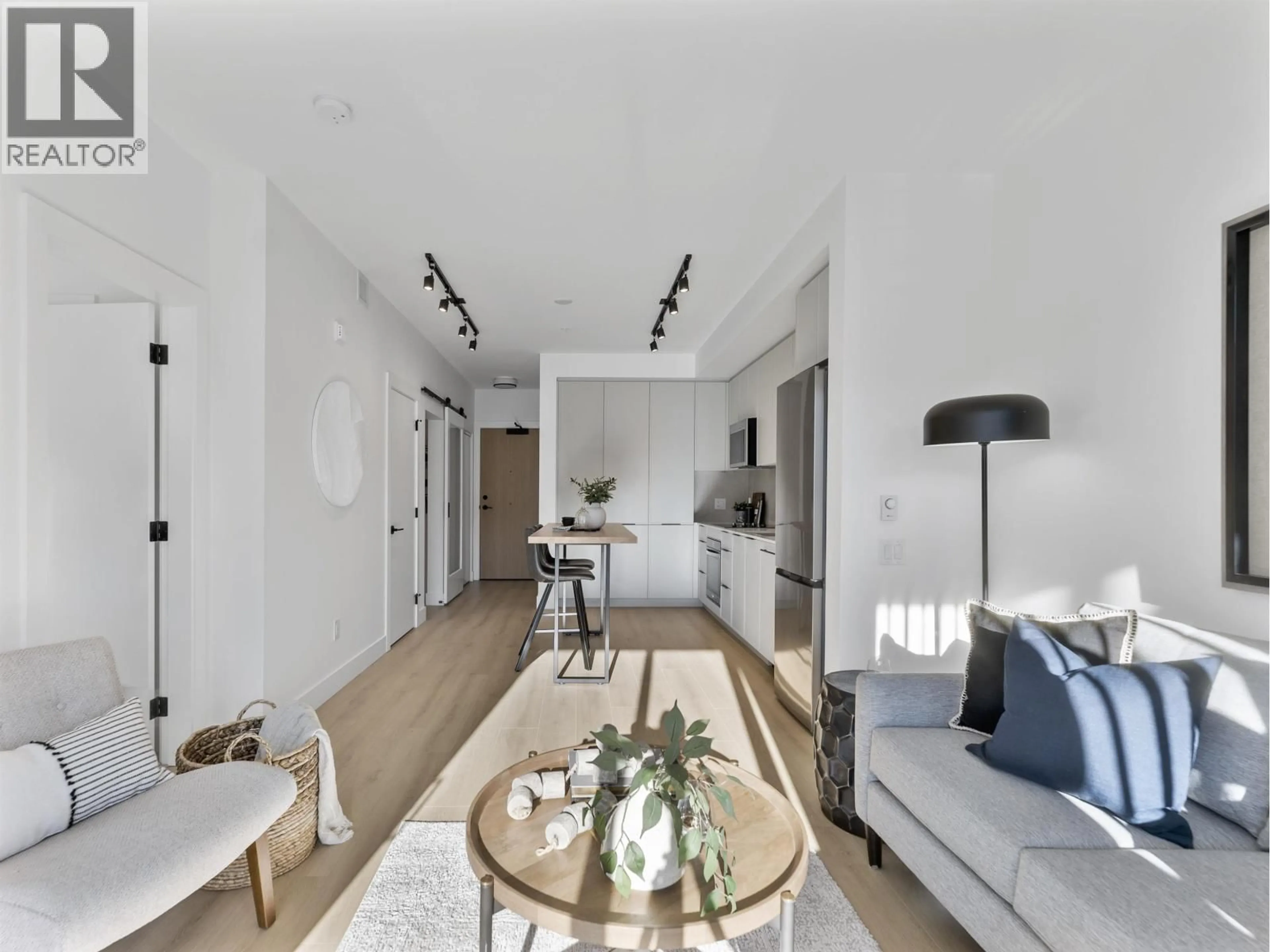 Living room with furniture, unknown for 505 - 3055 MURRAY STREET, Port Moody British Columbia V3H0P4