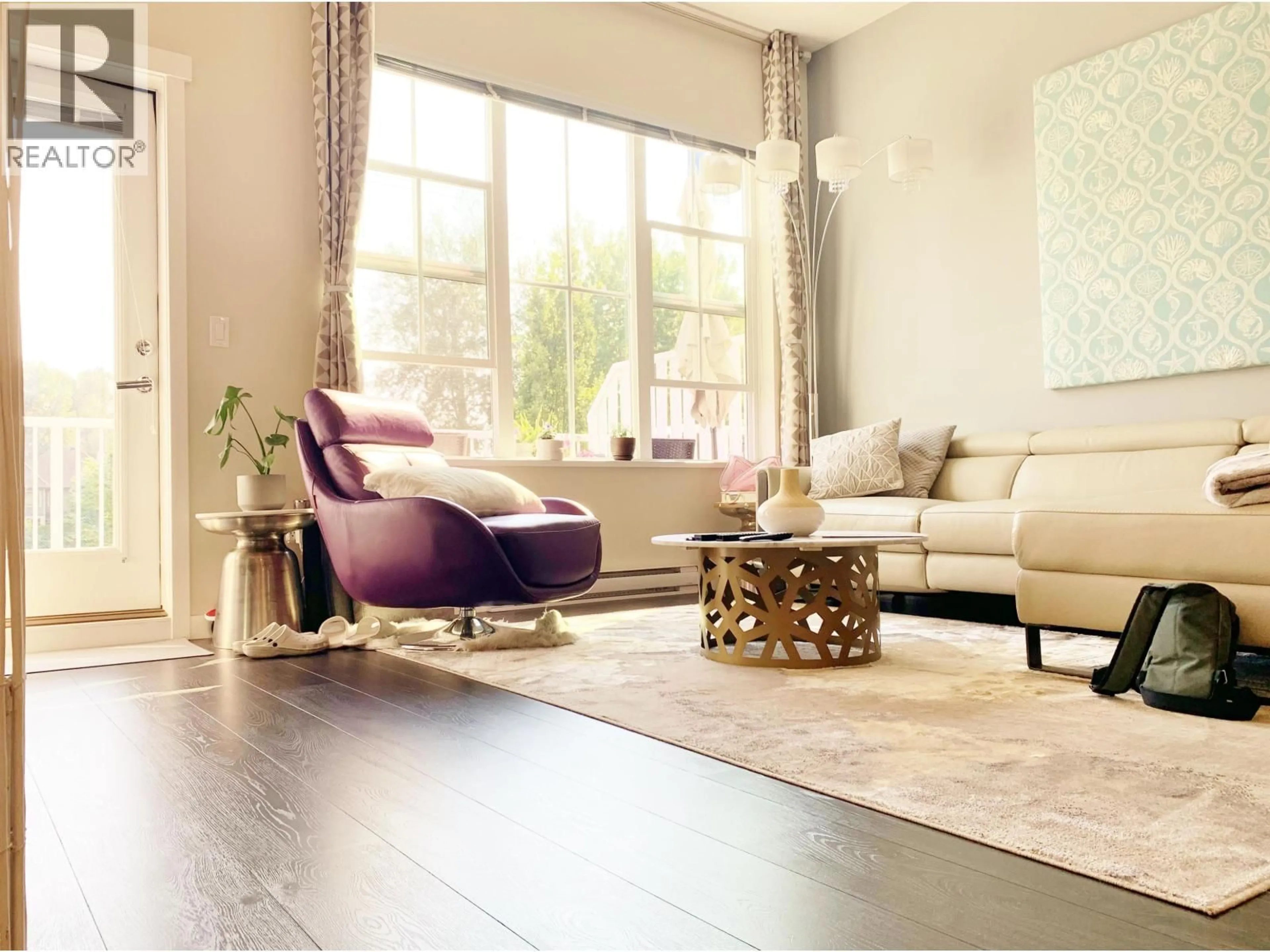 Living room with furniture, wood/laminate floor for 46 - 5550 ADMIRAL WAY, Delta British Columbia V4K0C4