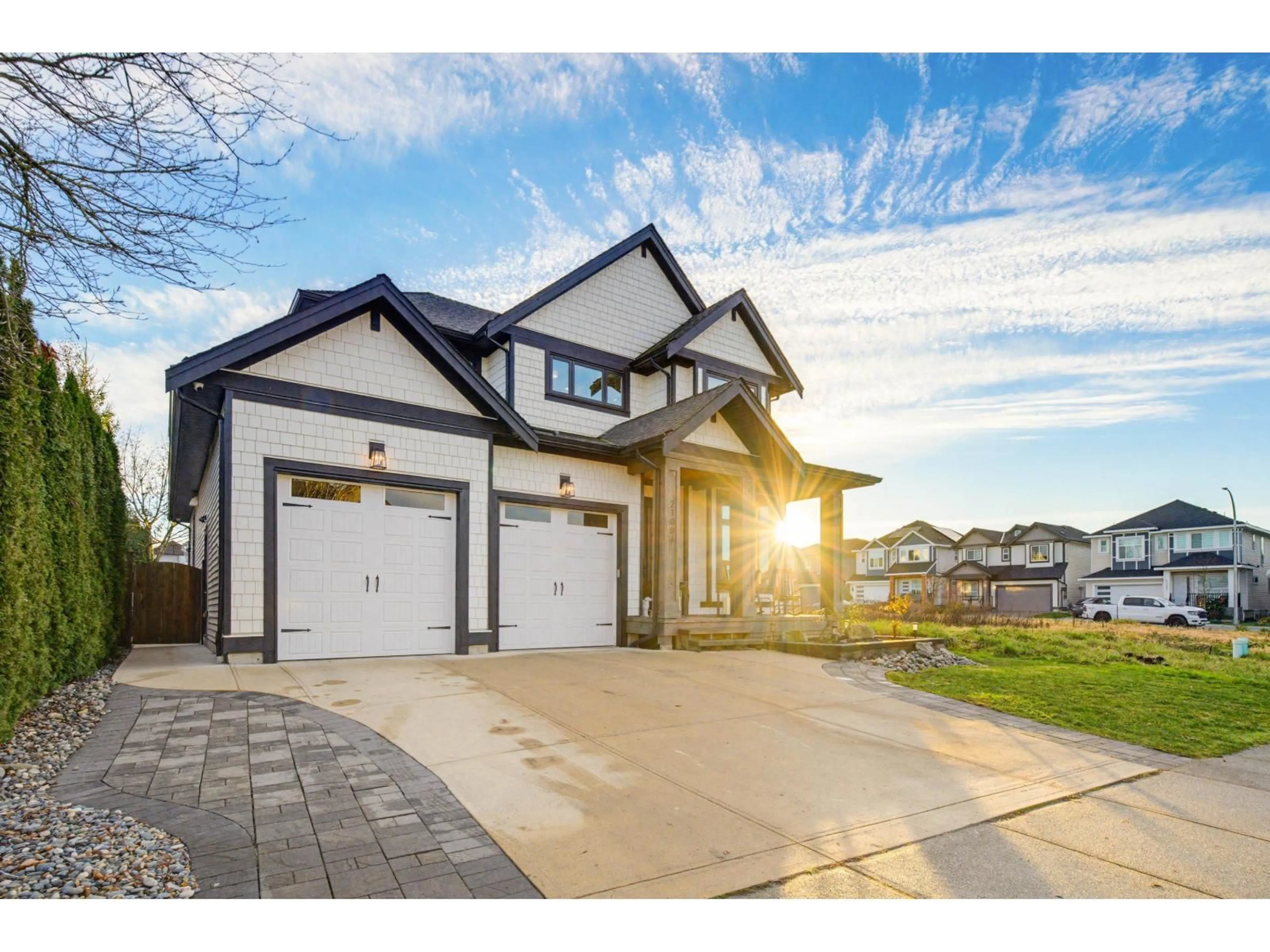 Home with vinyl exterior material, street for 21006 83B AVENUE, Langley British Columbia V2Y0C1