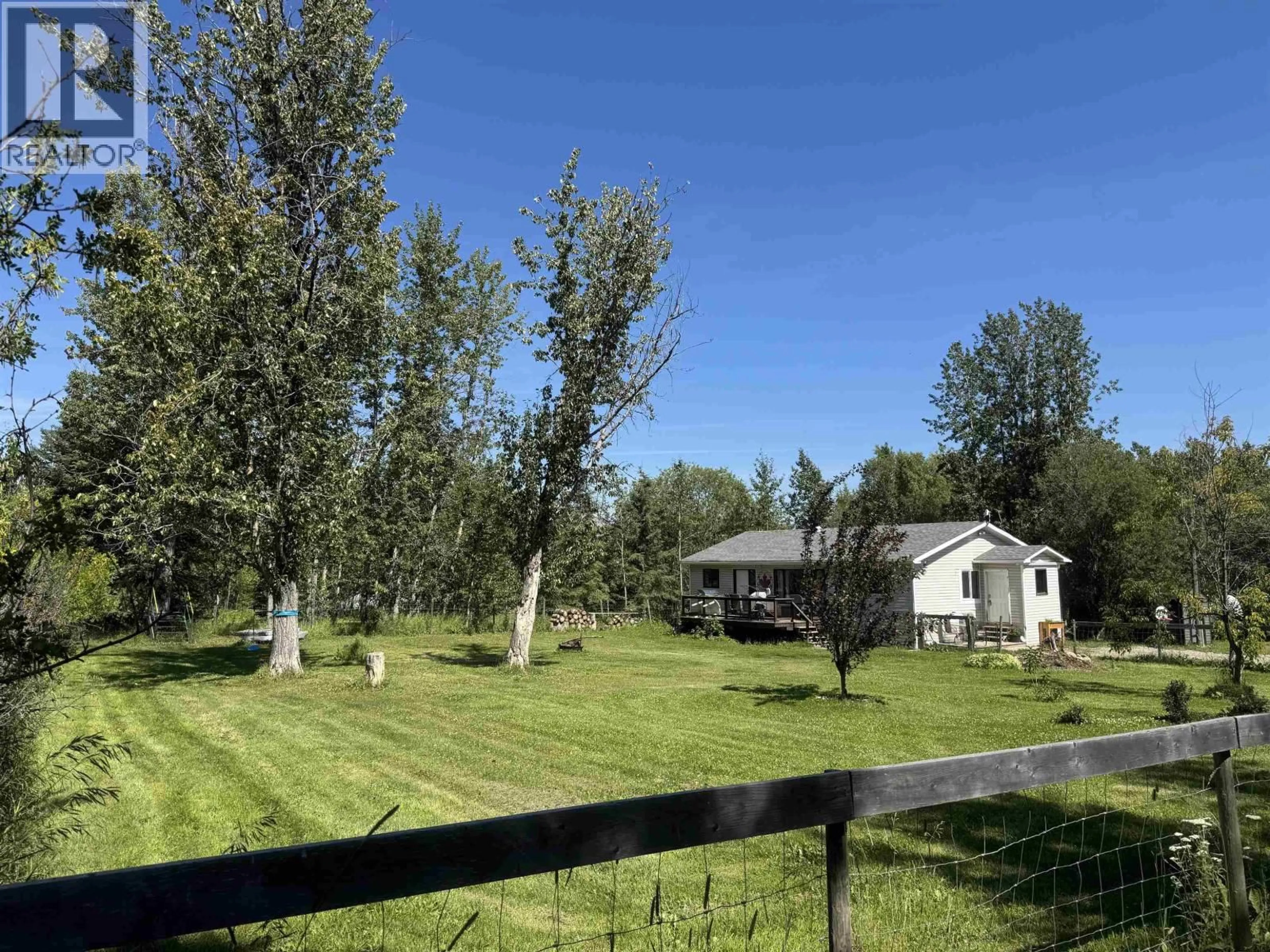 A pic from outside/outdoor area/front of a property/back of a property/a pic from drone, forest/trees view for 14651 COFFEE CREEK SUBDIV, Charlie Lake British Columbia V1J8L9
