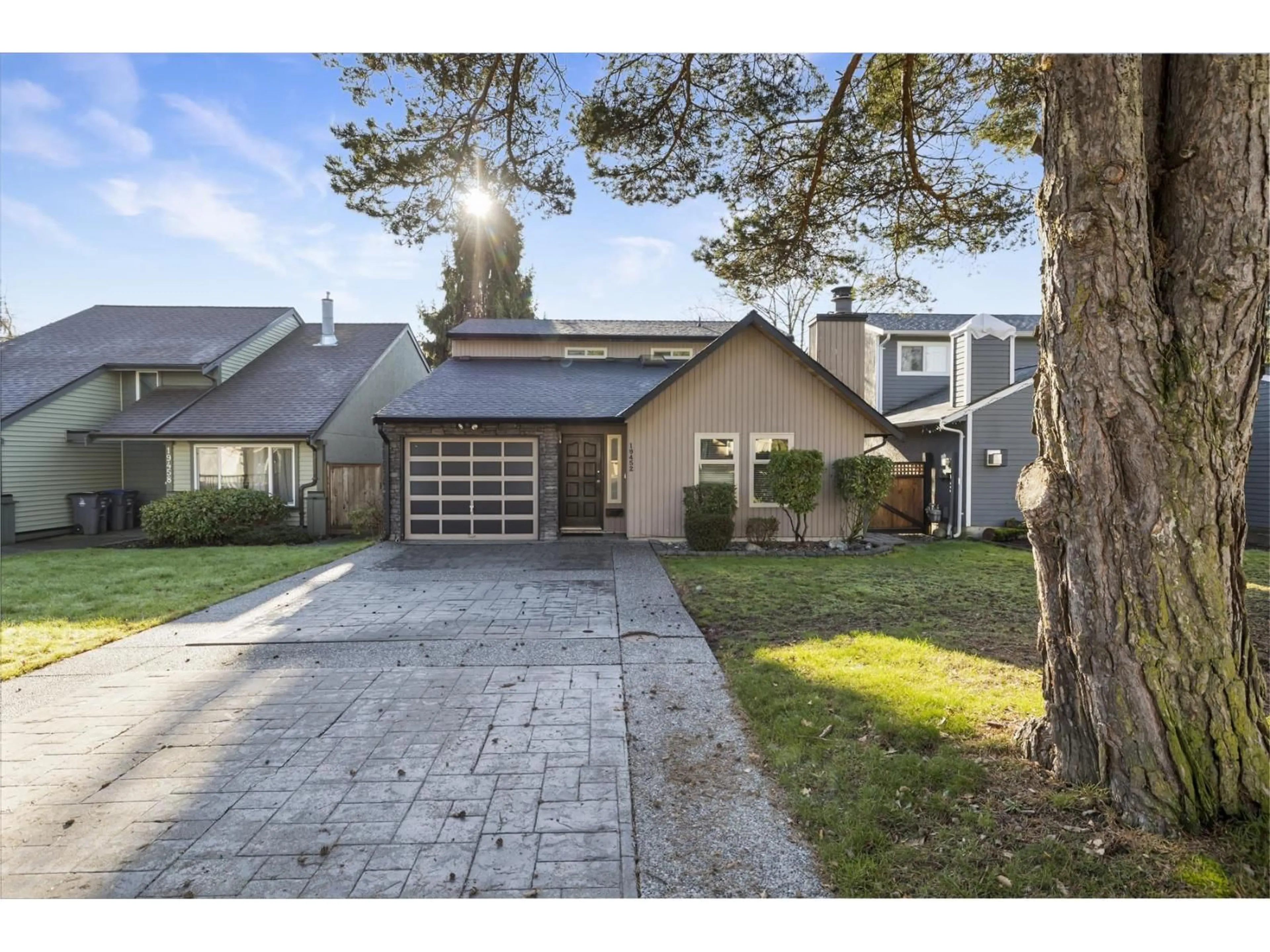 Home with brick exterior material, street for 19452 61 AVENUE, Surrey British Columbia V3S7L3