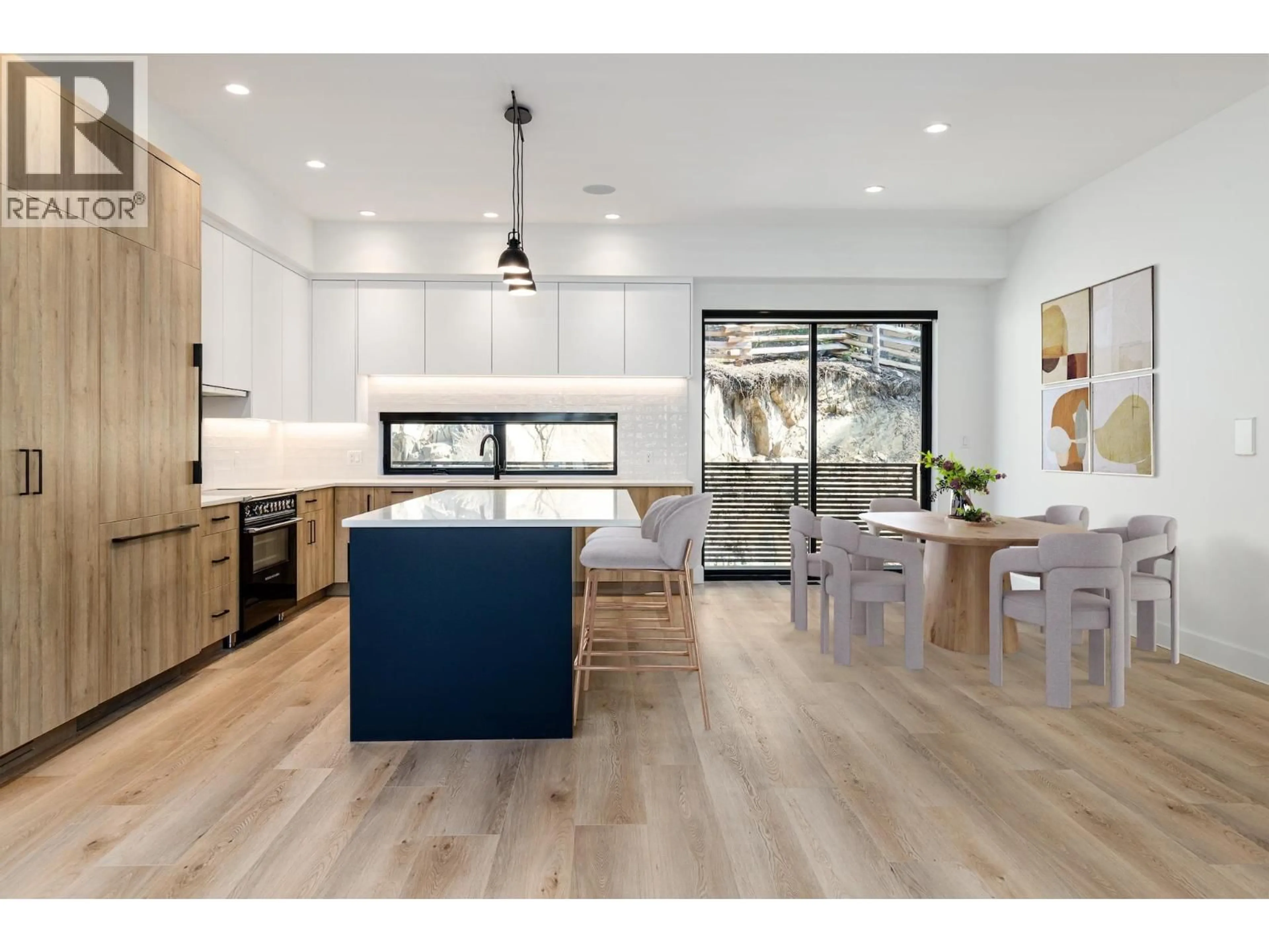 Open concept kitchen, wood/laminate floor for 18 - 2077 GARIBALDI WAY, Whistler British Columbia V0N1B2