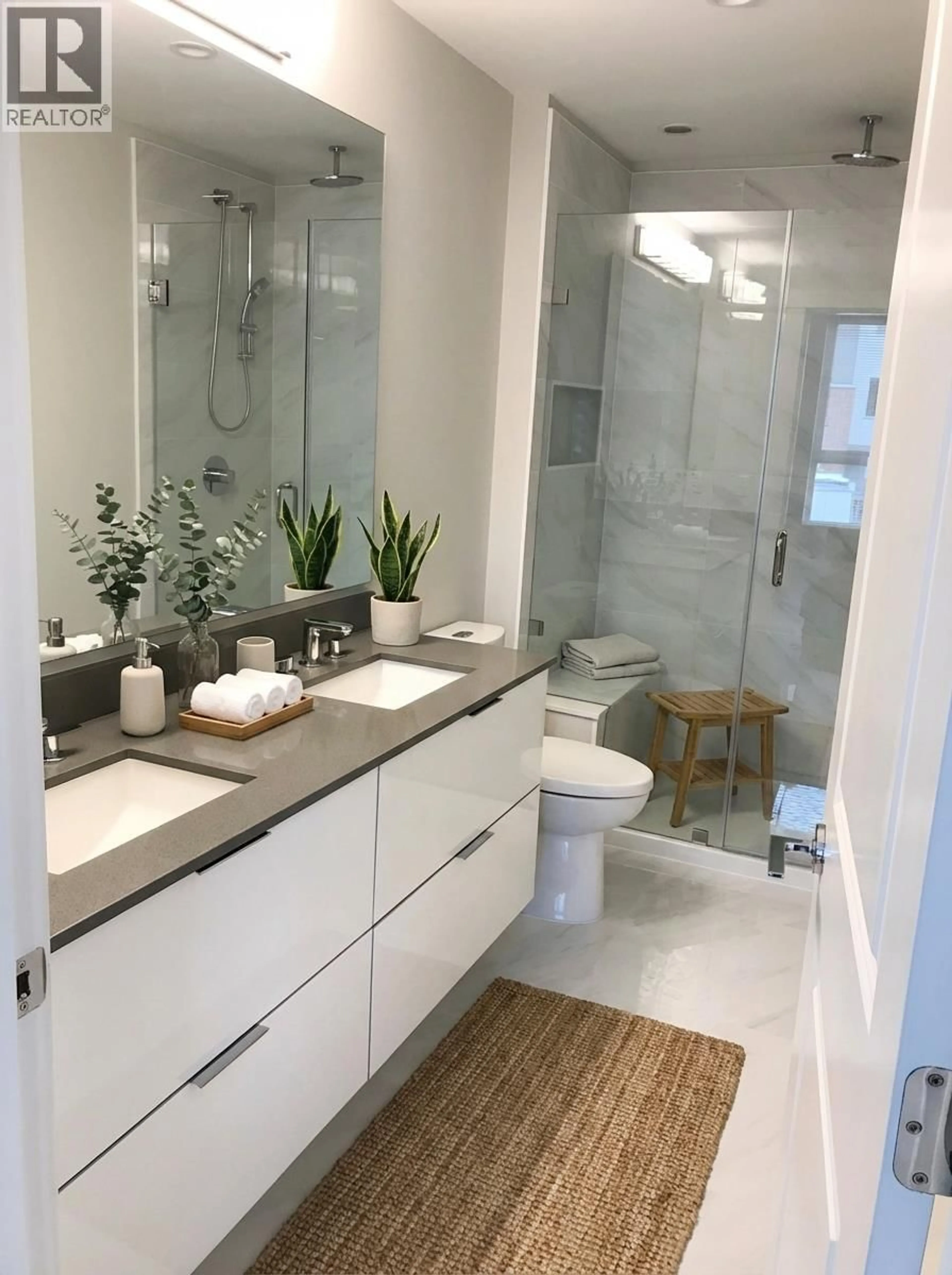 Contemporary bathroom, ceramic/tile floor for 101 - 2663 LIBRARY LANE, North Vancouver British Columbia V7J0B9