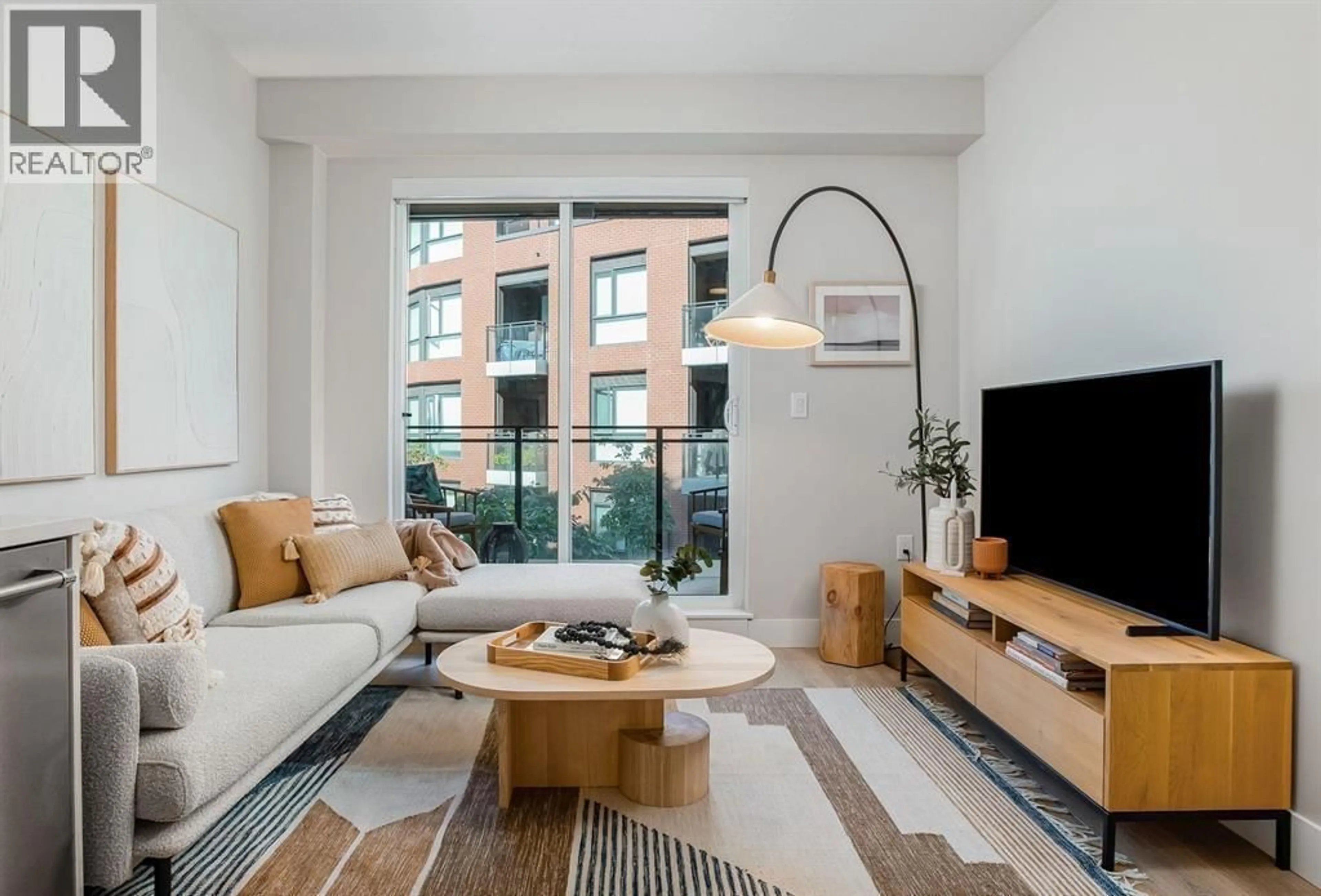 Living room with furniture, unknown for 311 - 3588 SAWMILL CRESCENT, Vancouver British Columbia V5S0H5