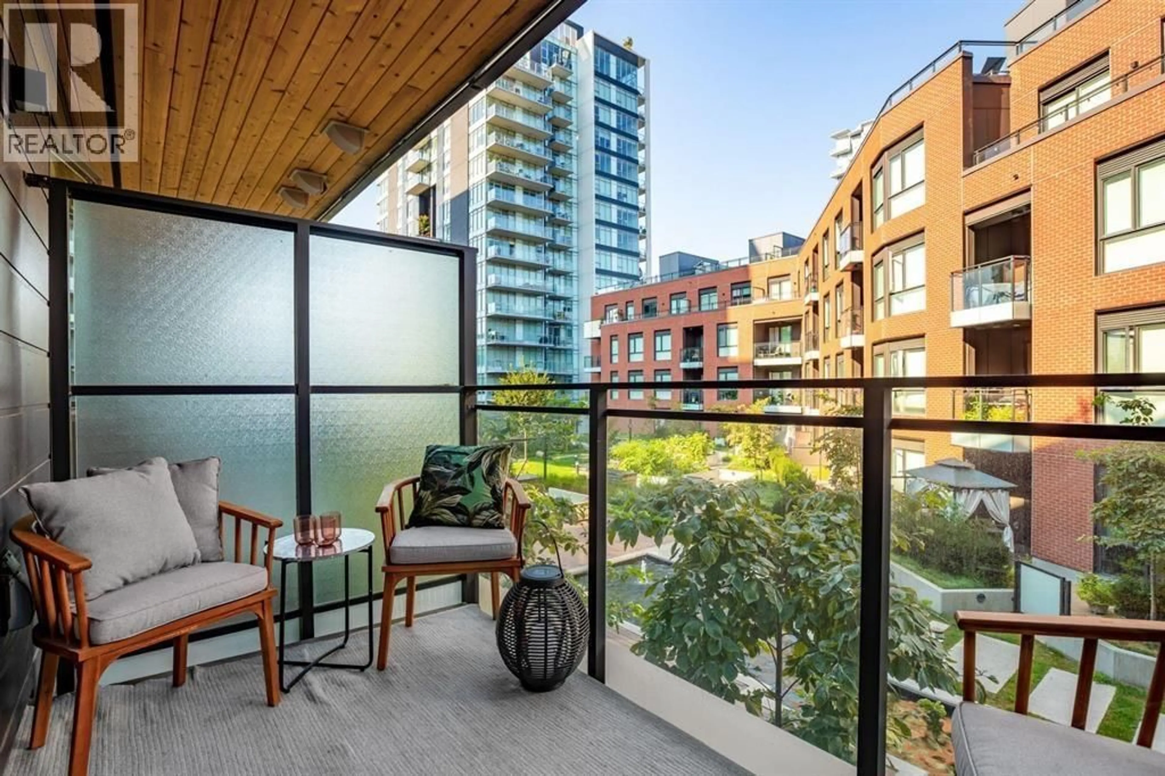 Balcony in the apartment, city buildings view from balcony for 311 - 3588 SAWMILL CRESCENT, Vancouver British Columbia V5S0H5